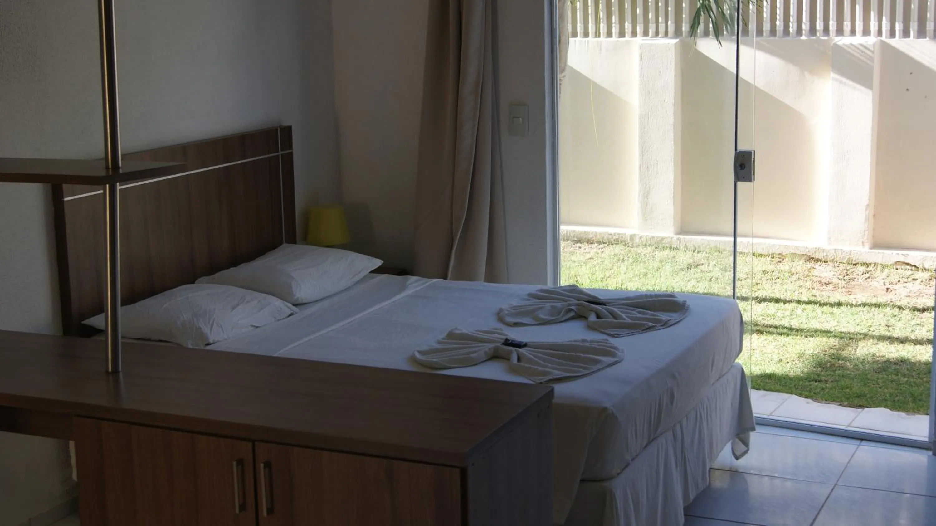 Bed in Pousada Brisa da Canoa