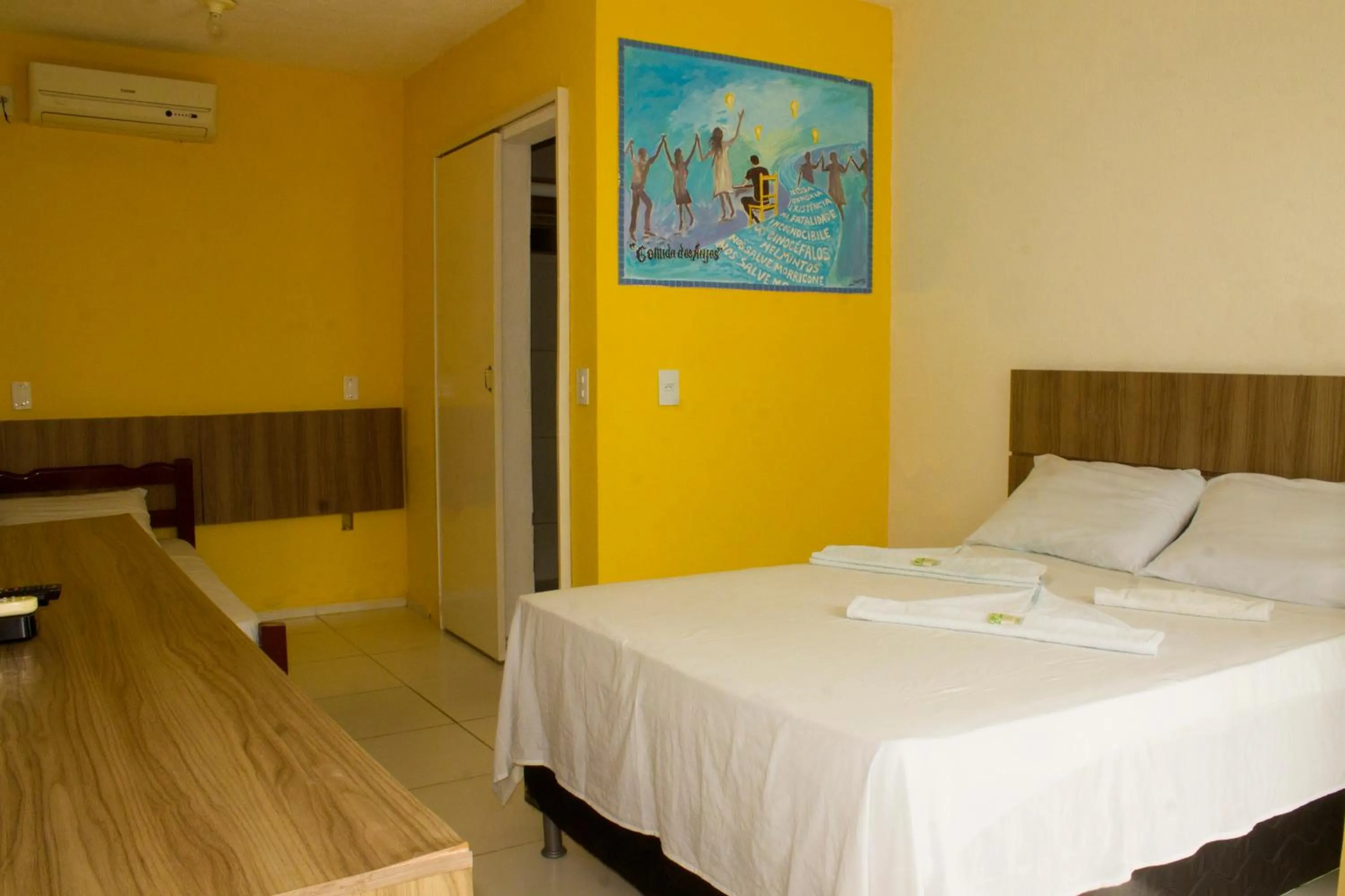 Bed in Pousada Brisa da Canoa