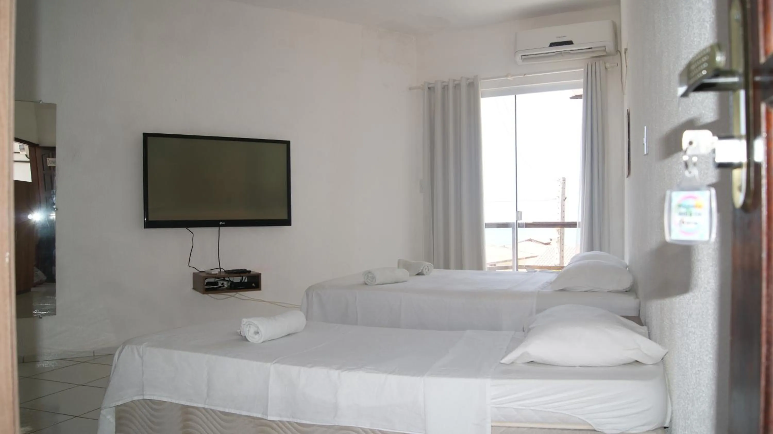 Bed in Pousada Brisa da Canoa