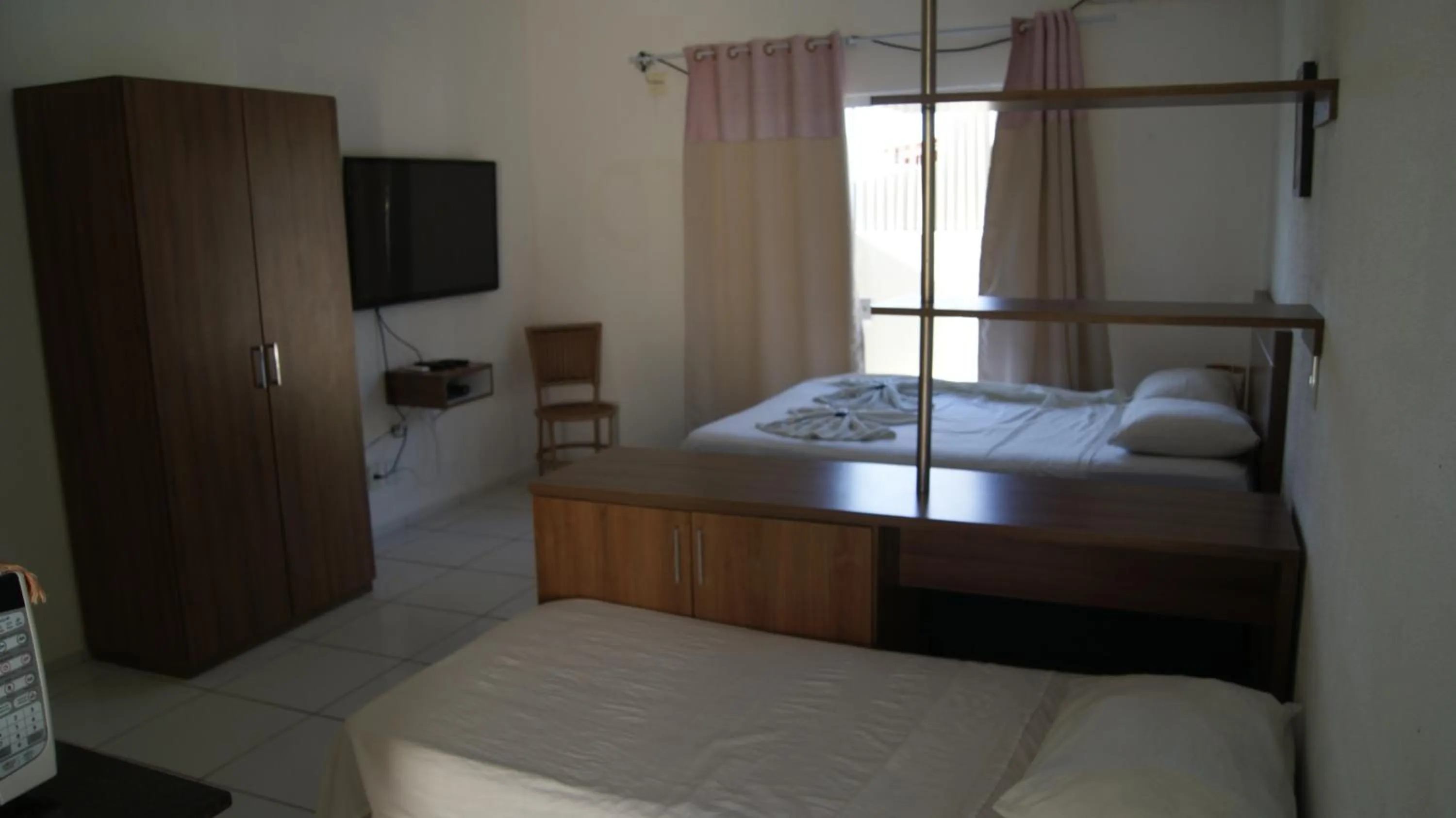 Bed in Pousada Brisa da Canoa