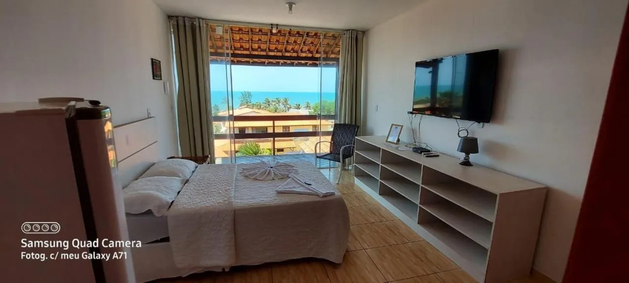 Bed in Pousada Brisa da Canoa