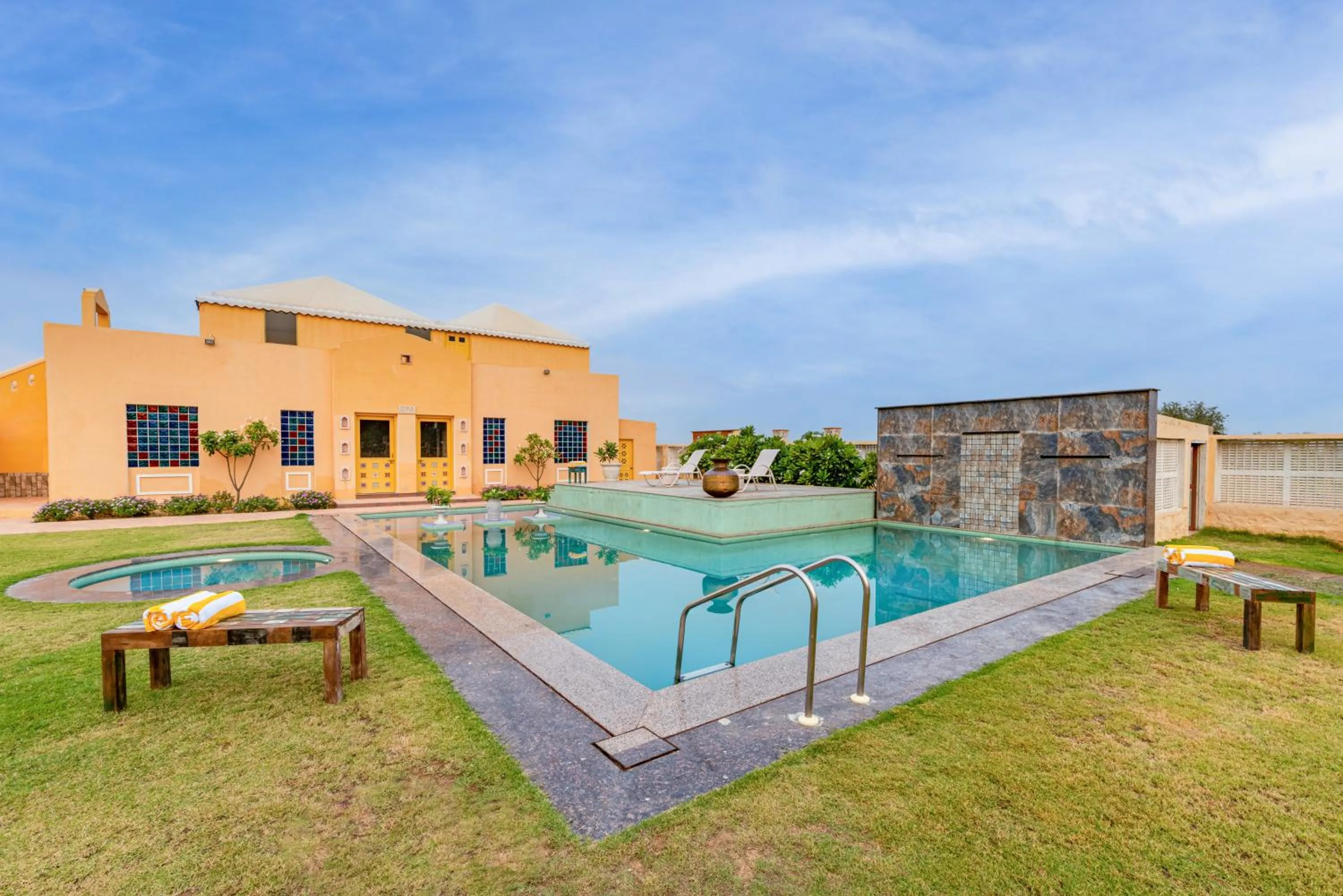 Swimming pool in Anand Bagh Resort & Spa by Ananta