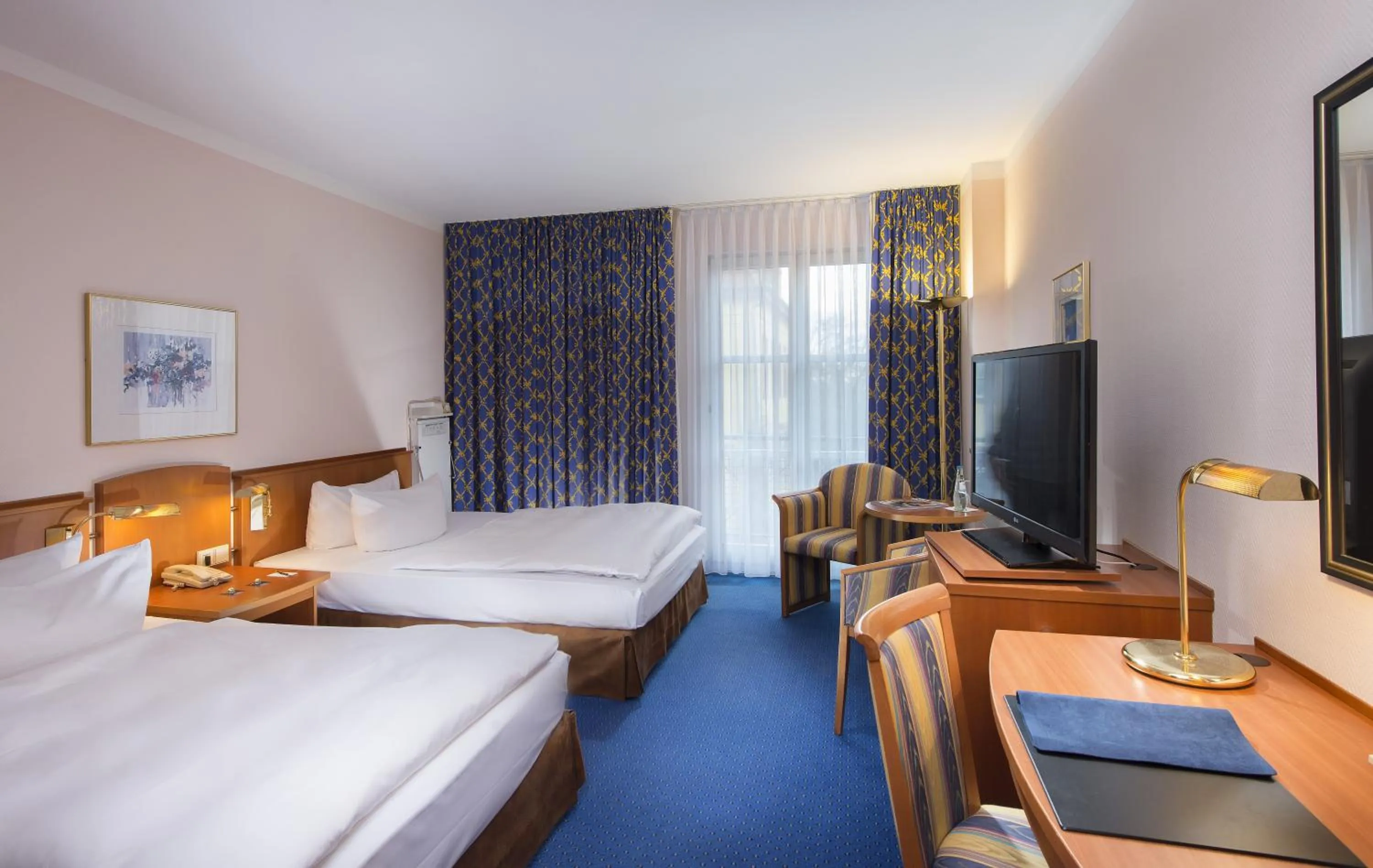Photo of the whole room, Bed in Radisson Blu Hotel Halle-Merseburg