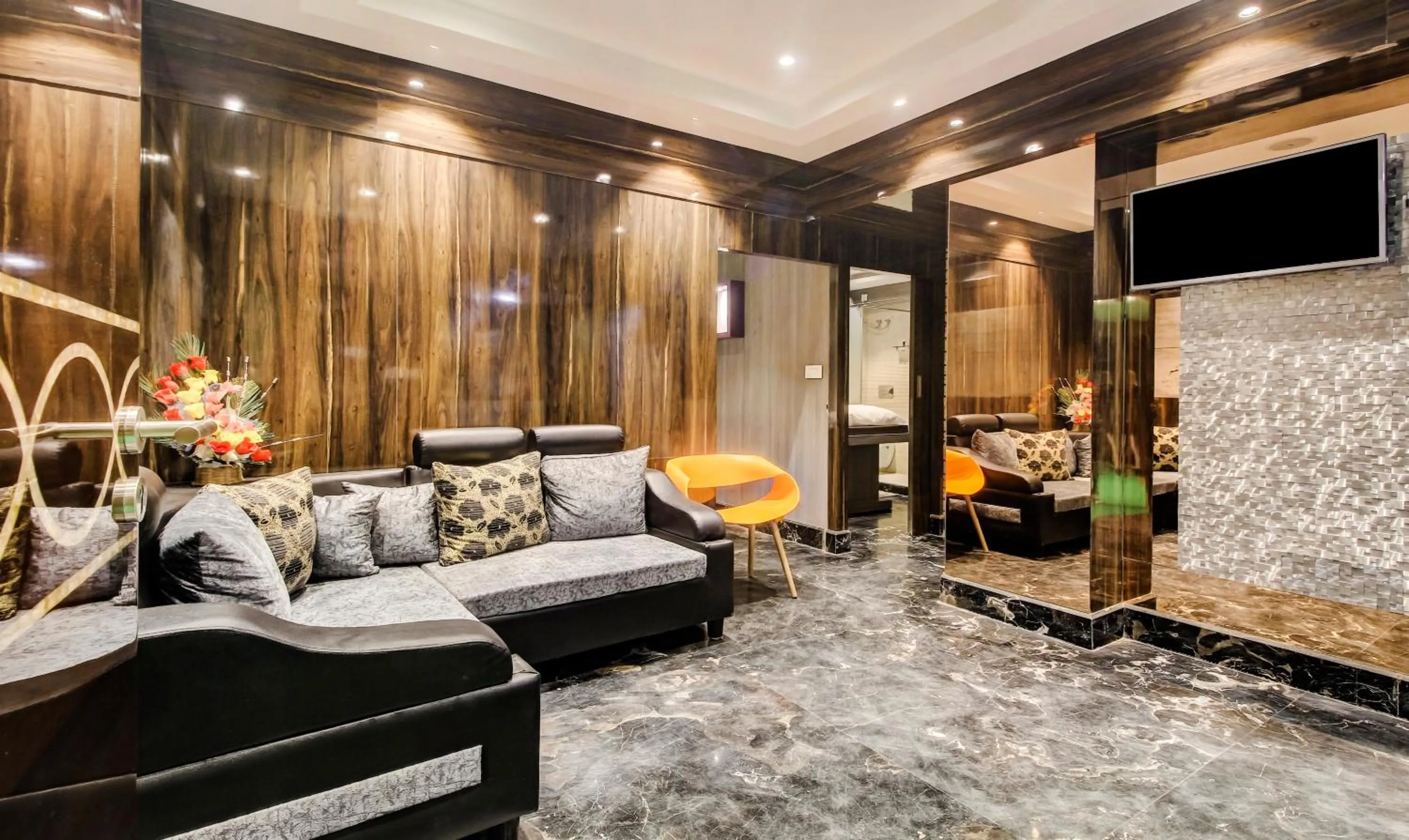 Living room in Treebo Premium Tahoora International