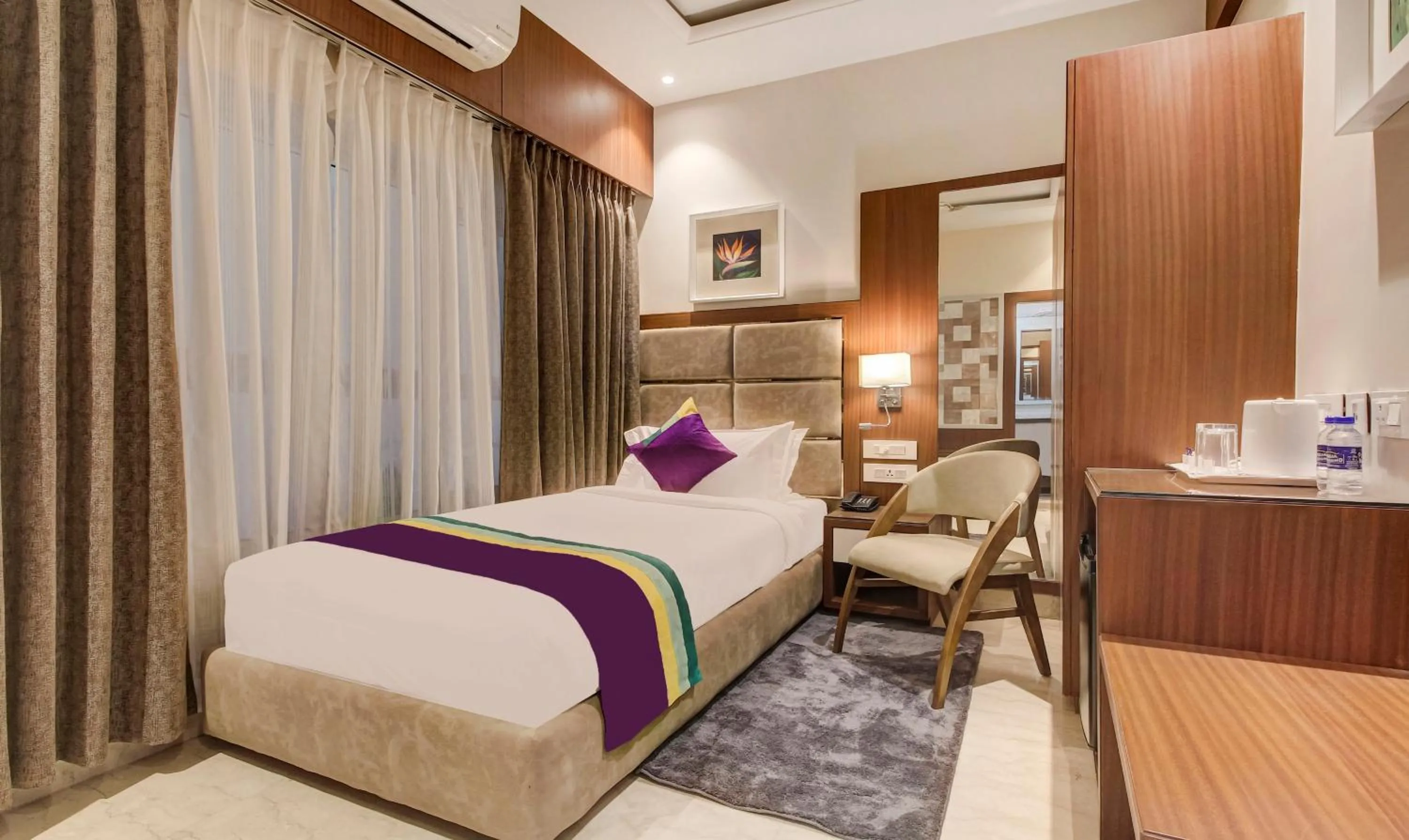 Bedroom, Bed in Treebo Premium Tahoora International