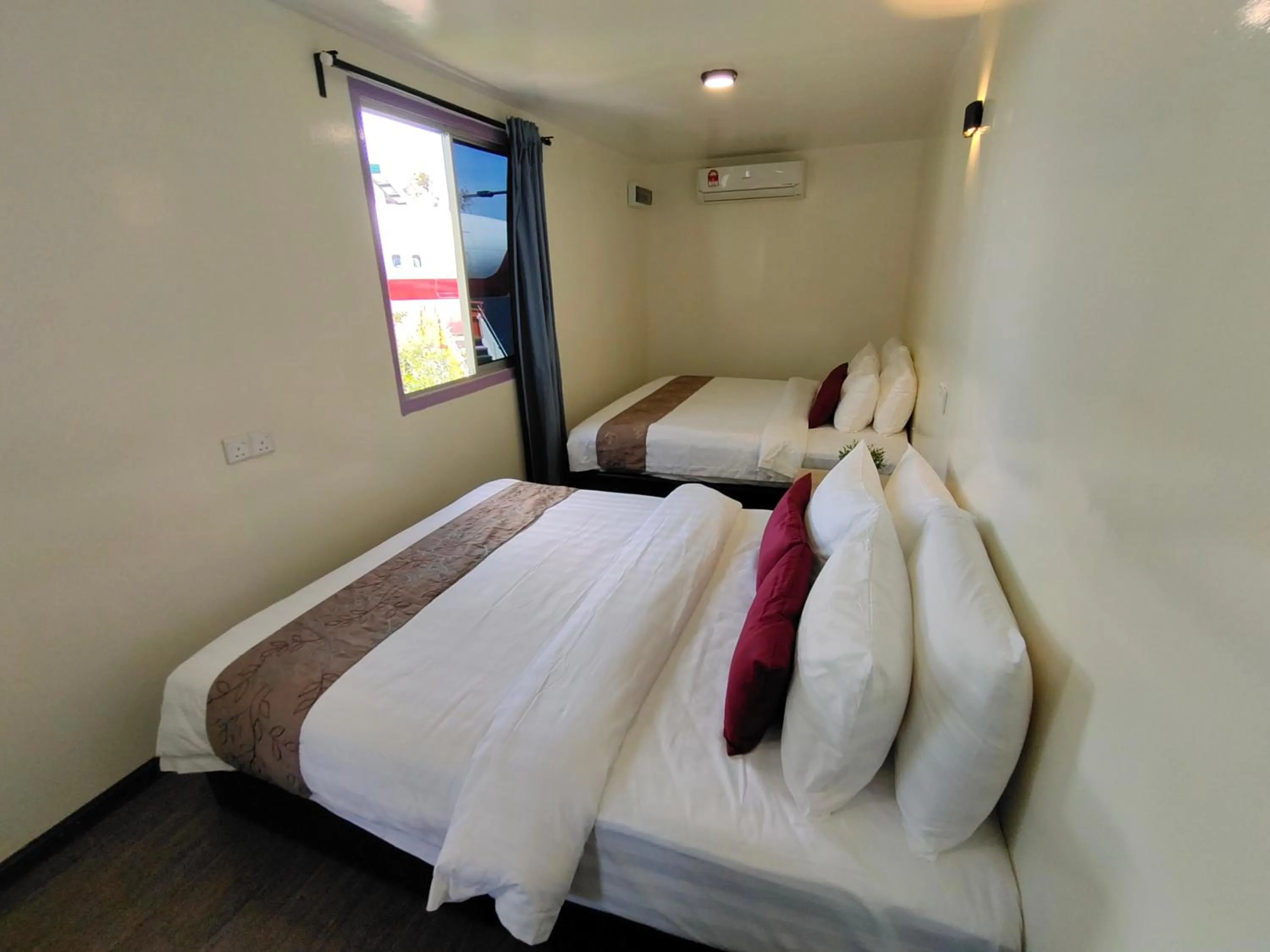 Bed in Twin Jets Resort