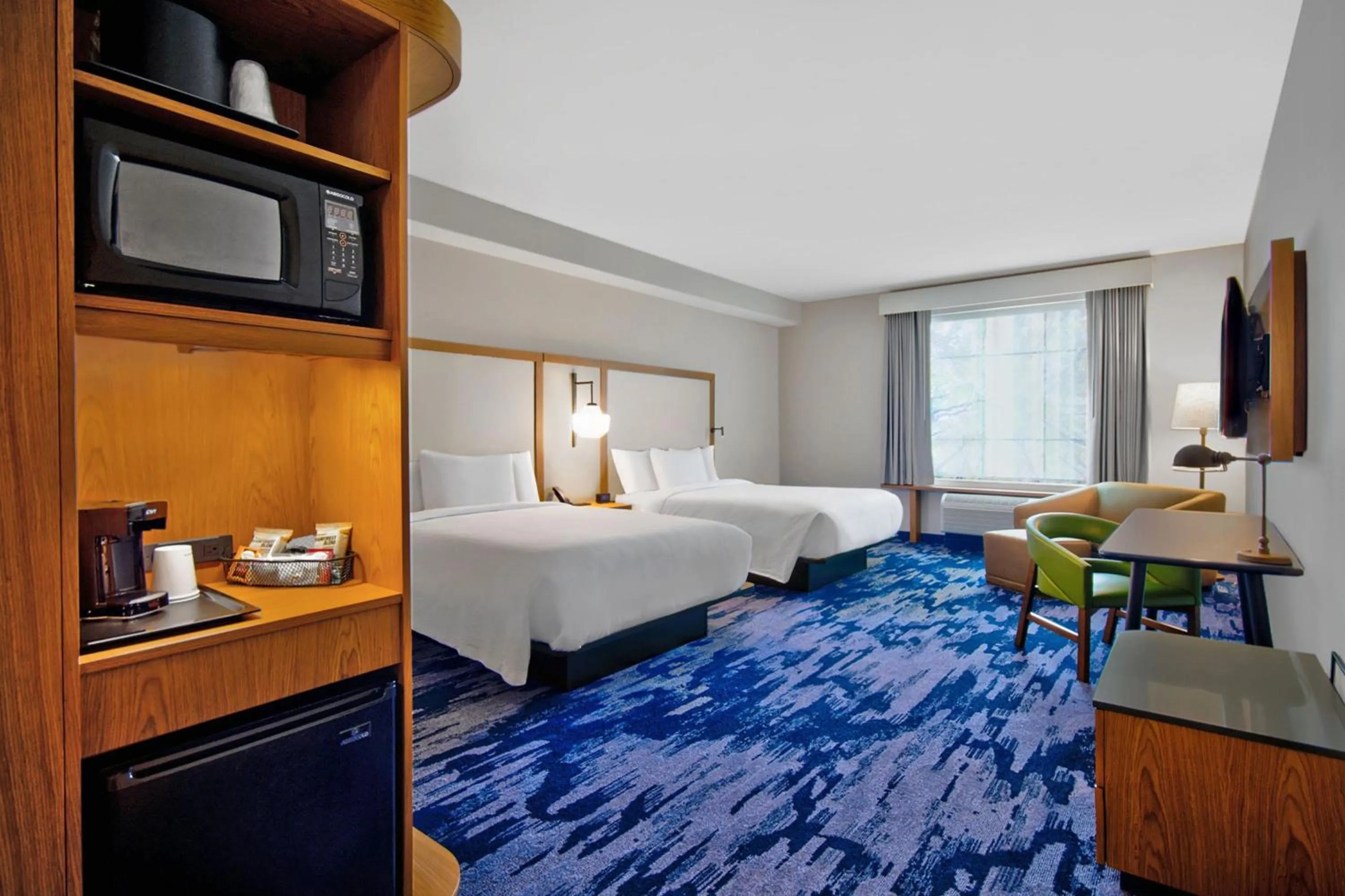 Photo of the whole room, Bed in Fairfield by Marriott Inn & Suites Orlando at FLAMINGO CROSSINGS® Town Center