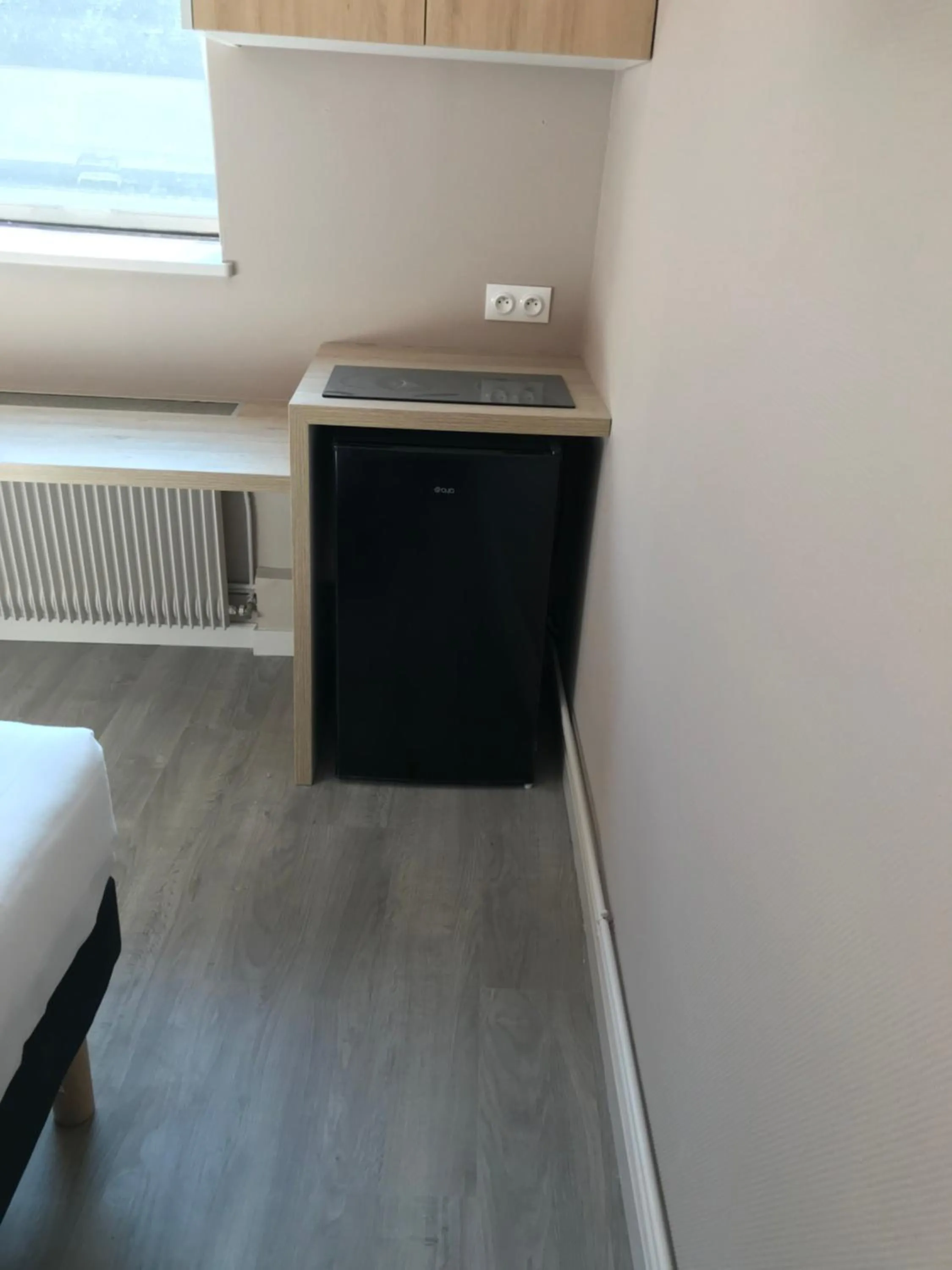 Kitchen or kitchenette in Appart'hôtel Voltaire