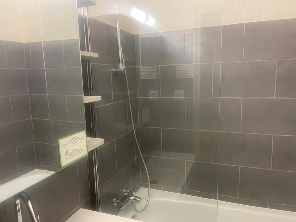 Bathroom in Appart'hôtel Voltaire