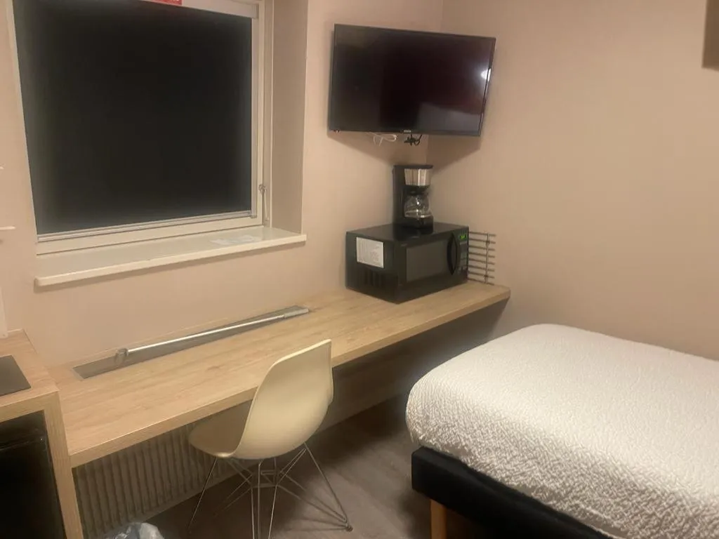 Photo of the whole room in Appart'hôtel Voltaire