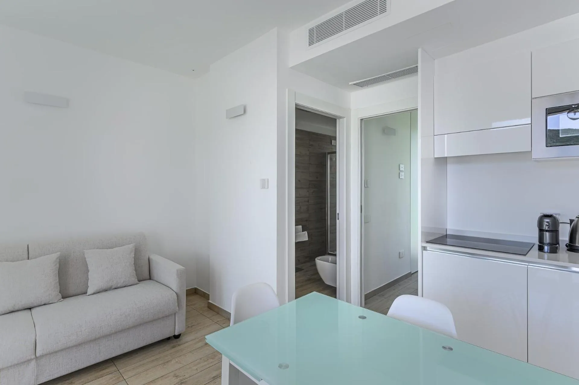 Living room in Capo Falcone Charming Apartments