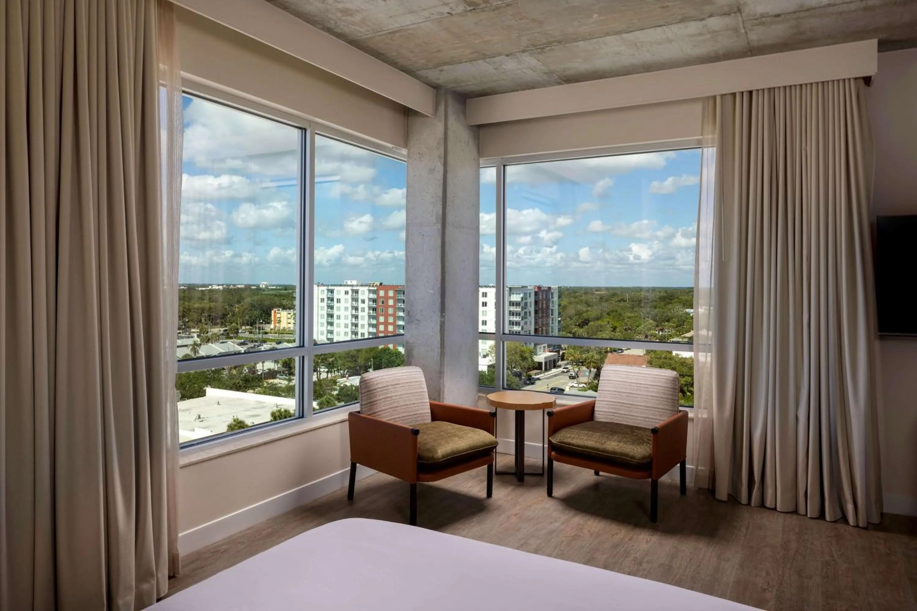 Living room, Bed in Hotel Melby Downtown Melbourne Tapestry Collection By Hilton