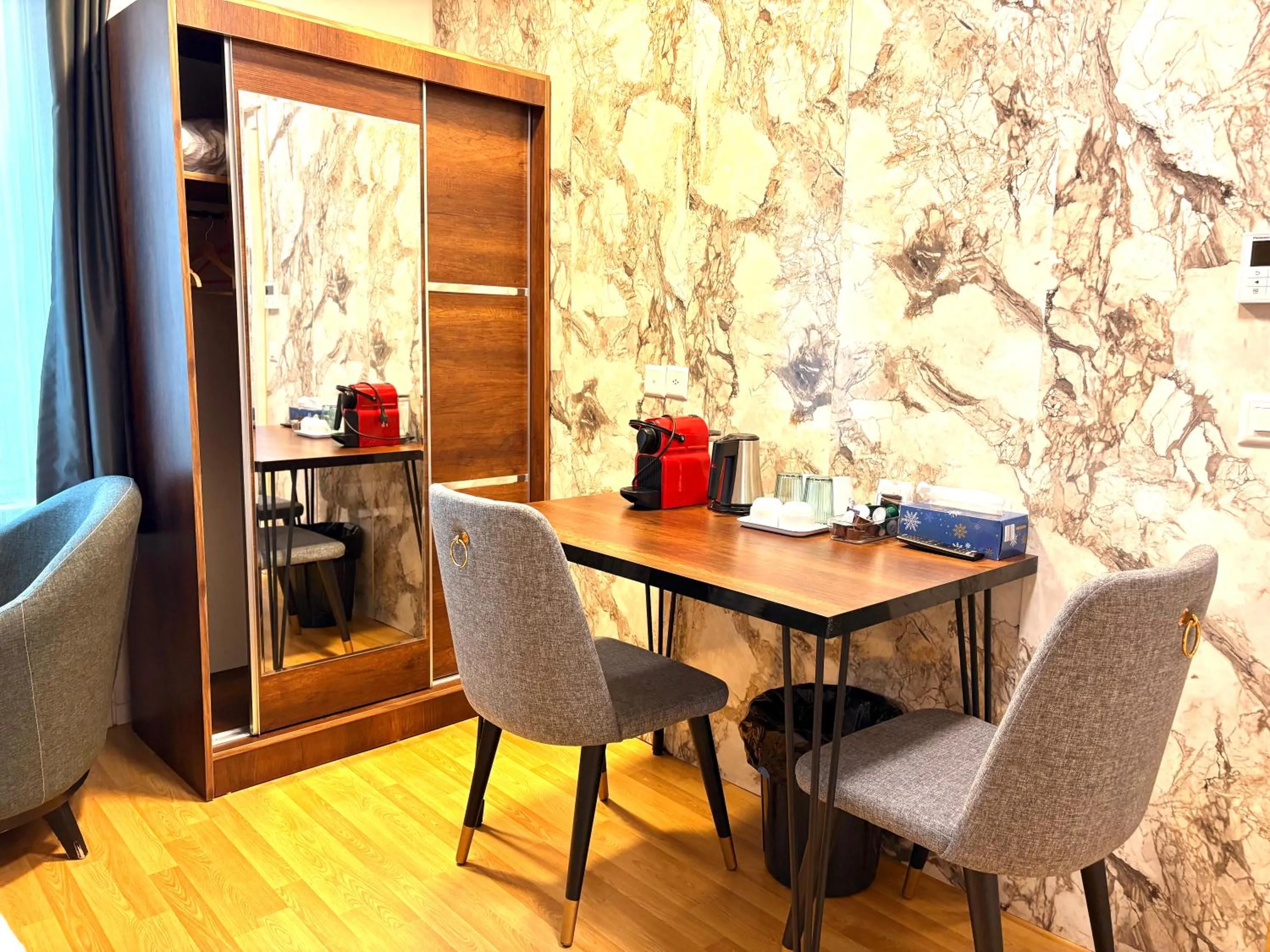 Seating area in Akomo Bern