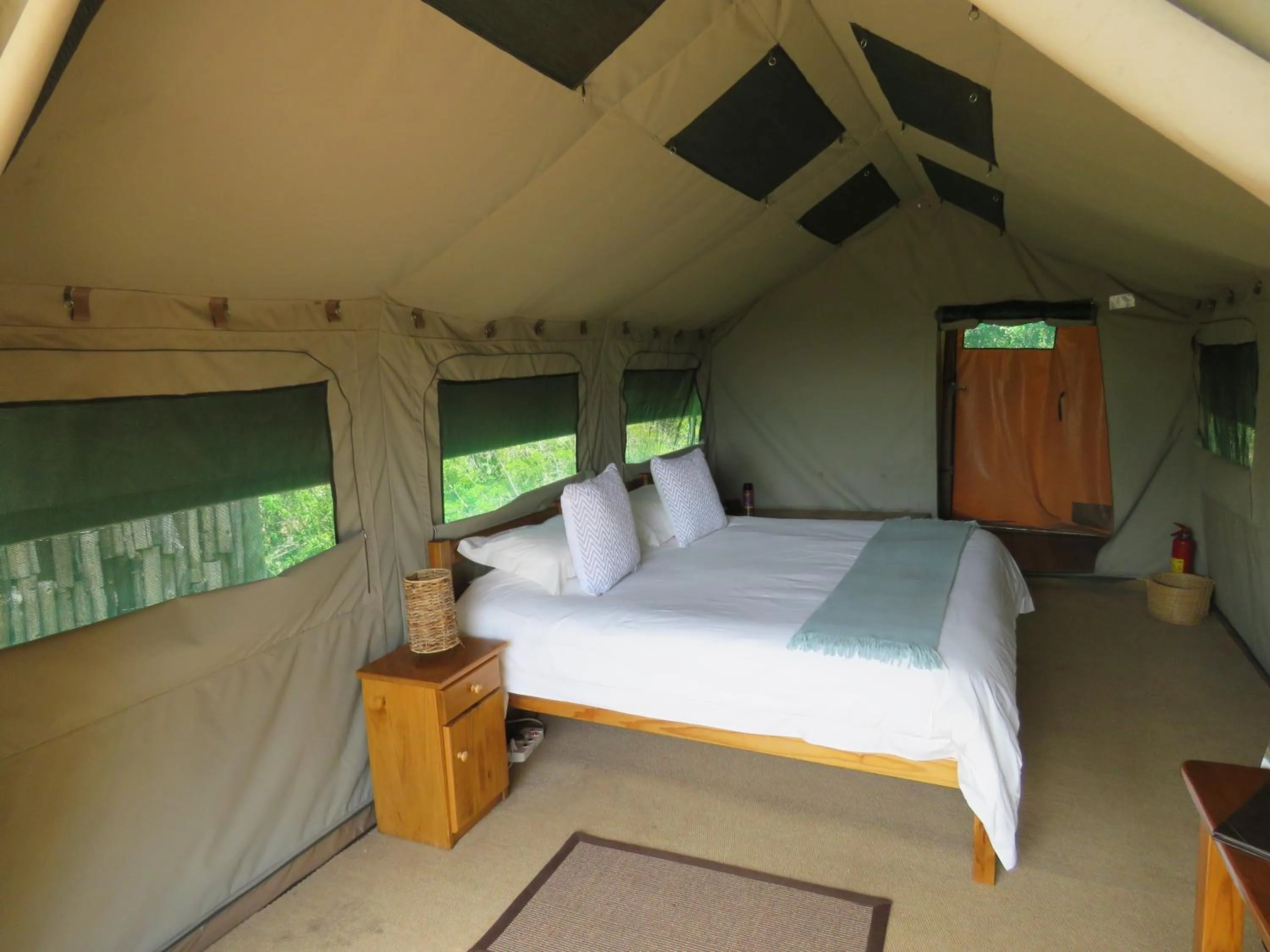 Bed in Woodbury Tented Camp – Amakhala Game Reserve
