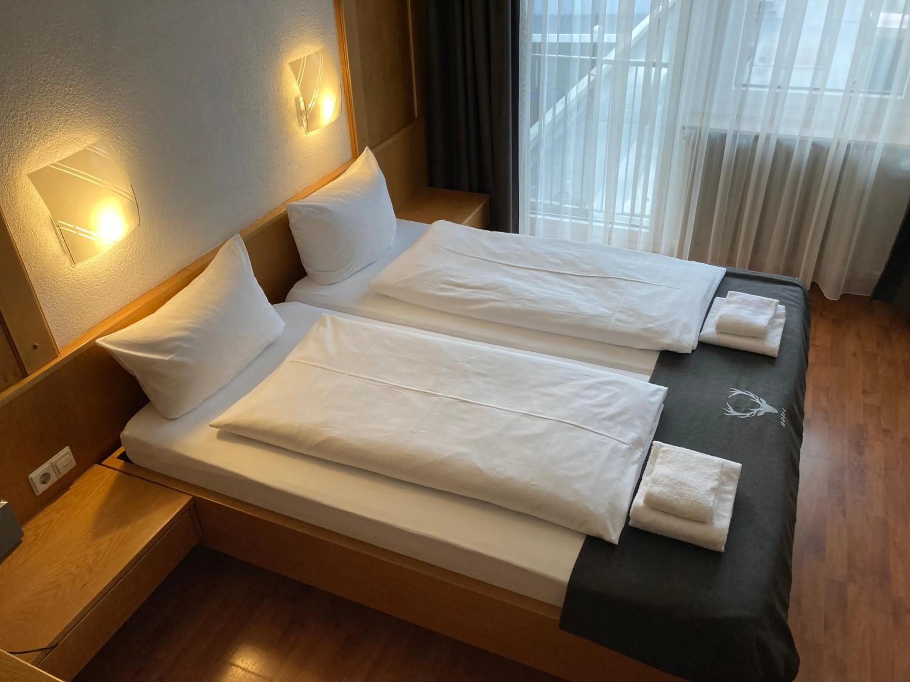 Bedroom, Bed in Hotel JÄGERHAUS in Singen am Hohentwiel