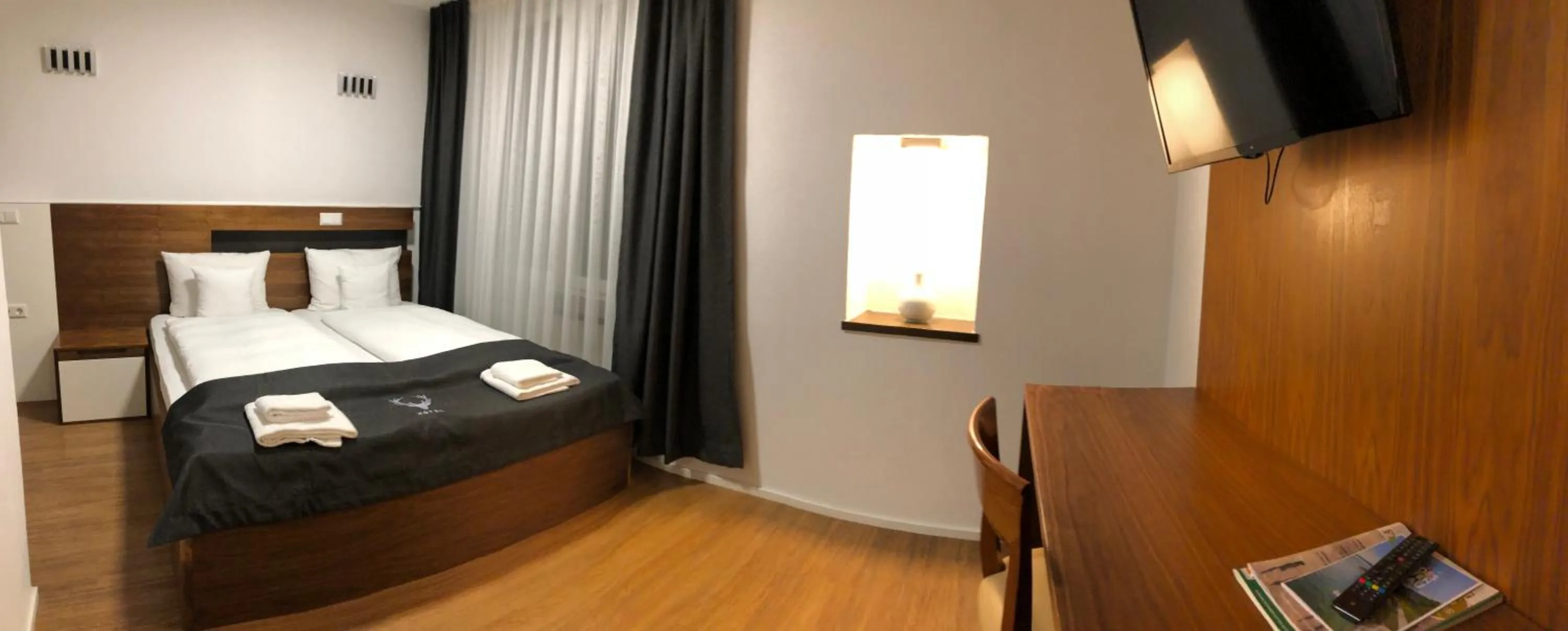 Photo of the whole room, Bed in Hotel JÄGERHAUS in Singen am Hohentwiel
