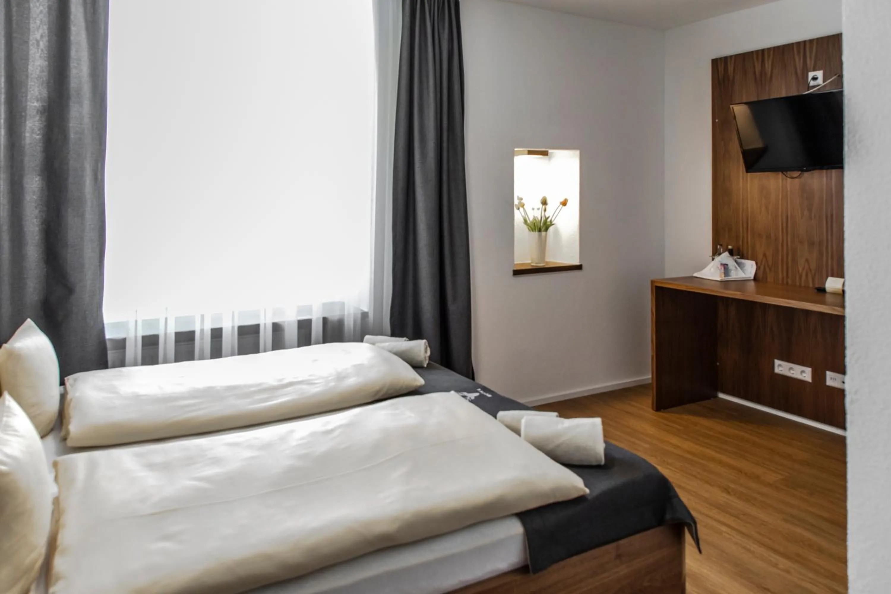 Bed in Hotel JÄGERHAUS in Singen am Hohentwiel