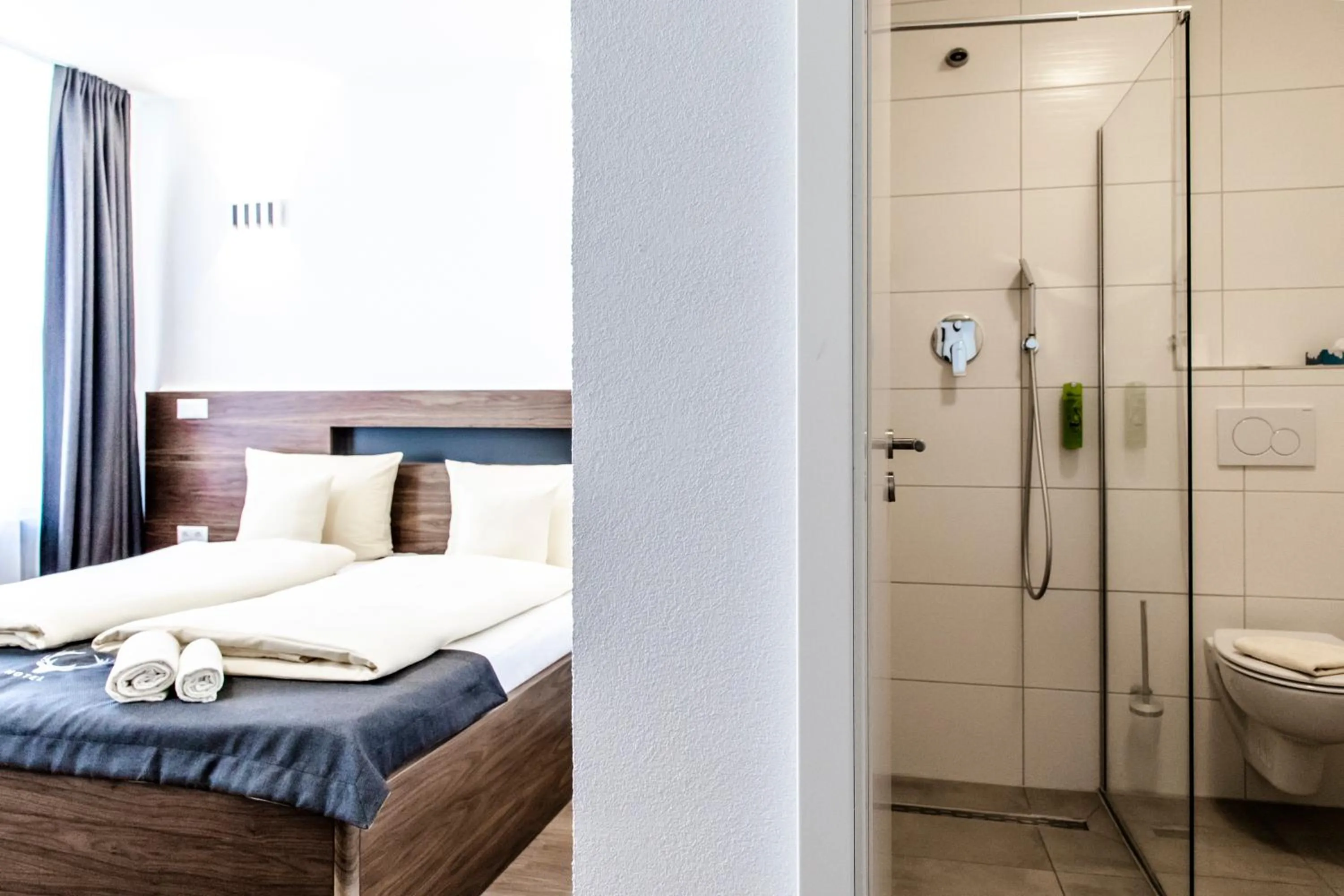 Photo of the whole room, Bed in Hotel JÄGERHAUS in Singen am Hohentwiel