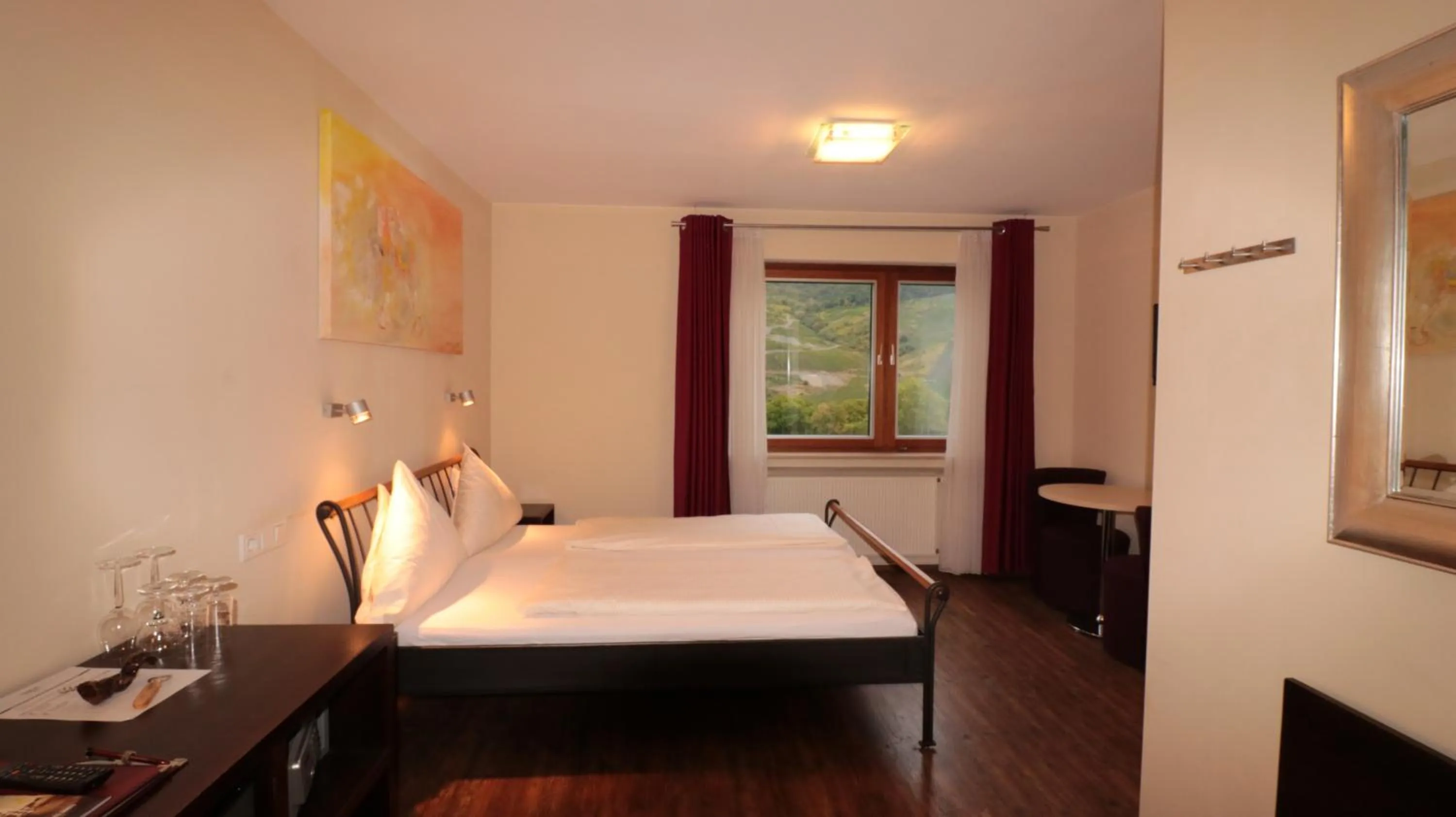 Photo of the whole room, Bed in Christiana's Wein & Art Hotel