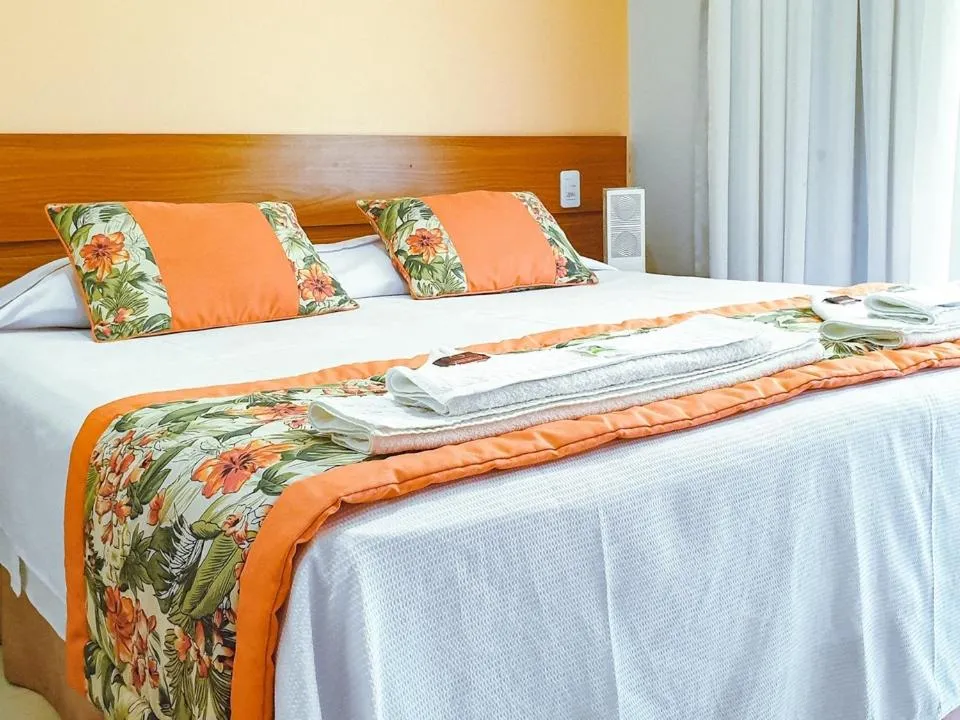 Bed in Pousada Cantinho da Praia