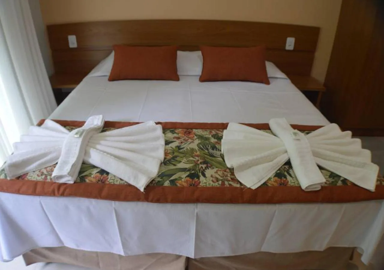 Bed in Pousada Cantinho da Praia