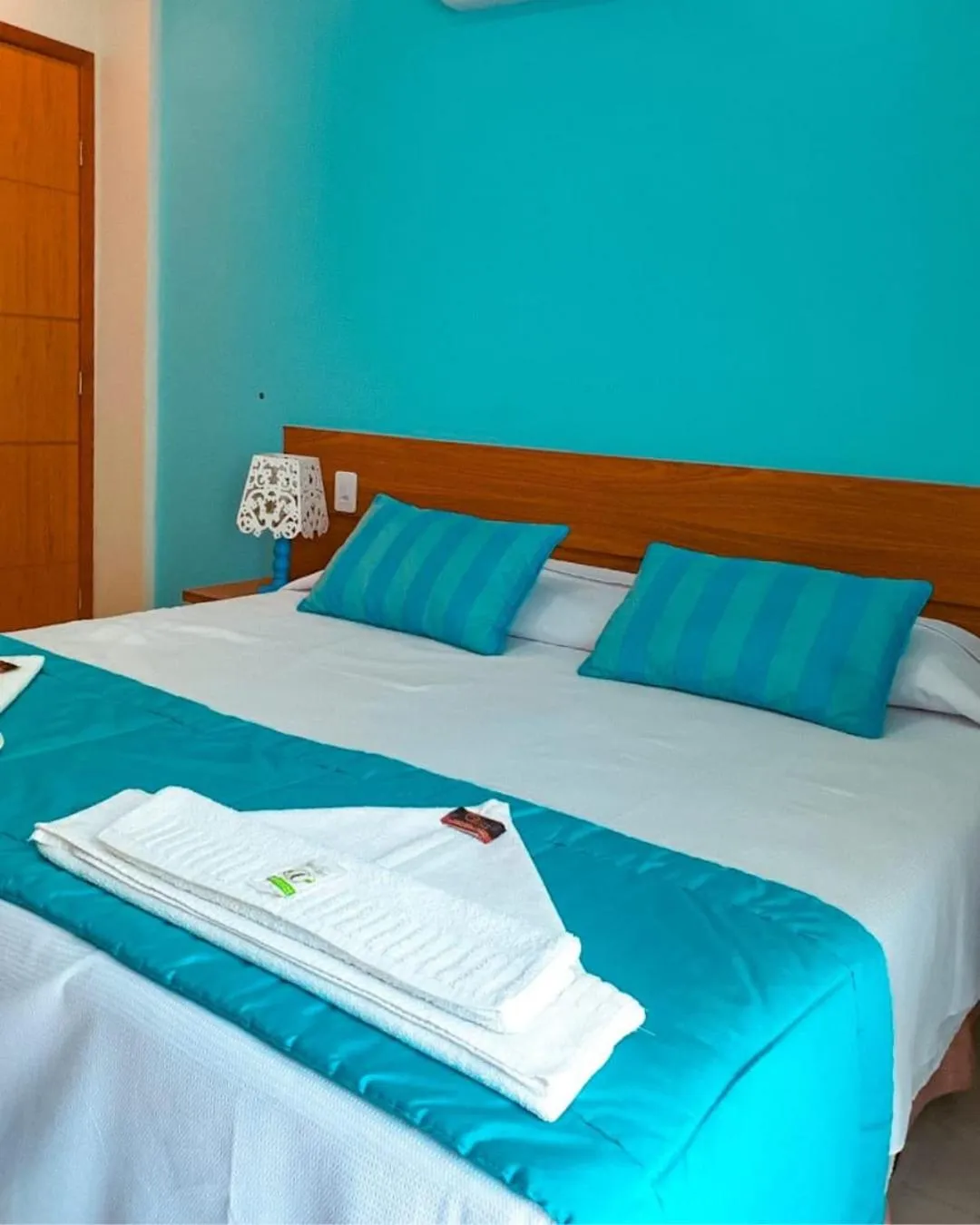 Bed in Pousada Cantinho da Praia