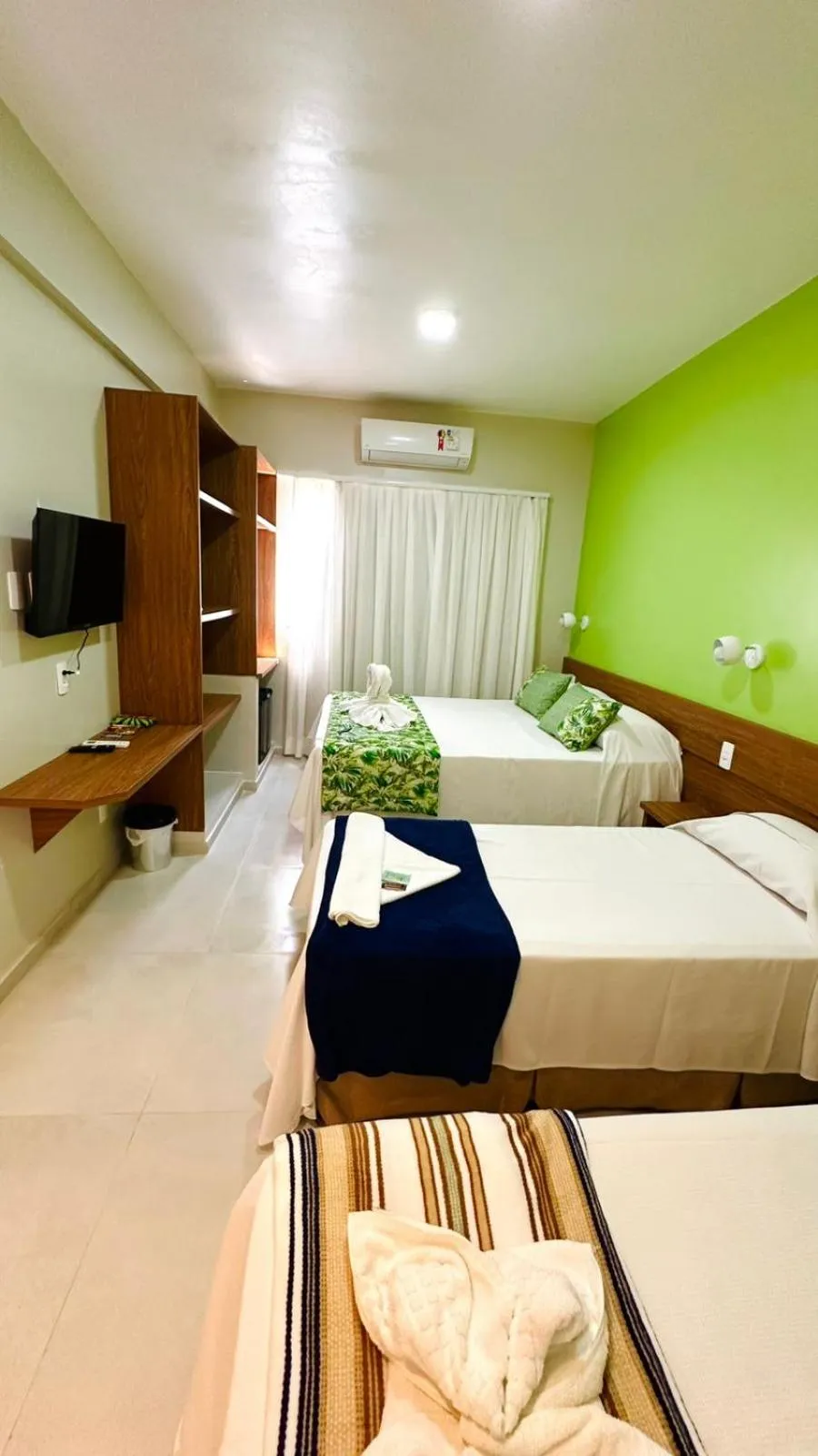 Bed in Pousada Cantinho da Praia