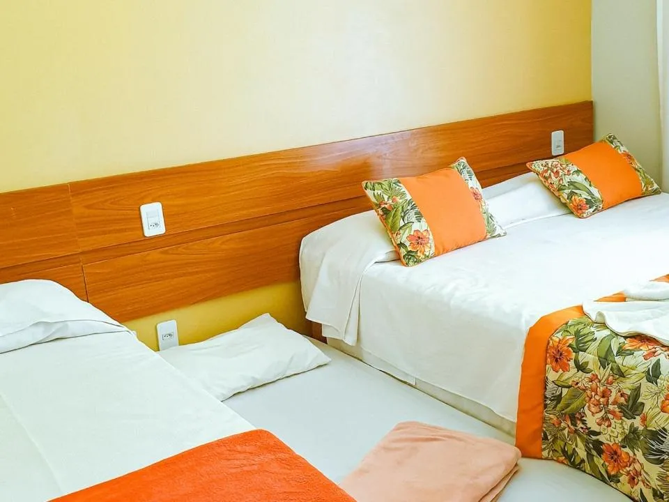 Bed in Pousada Cantinho da Praia