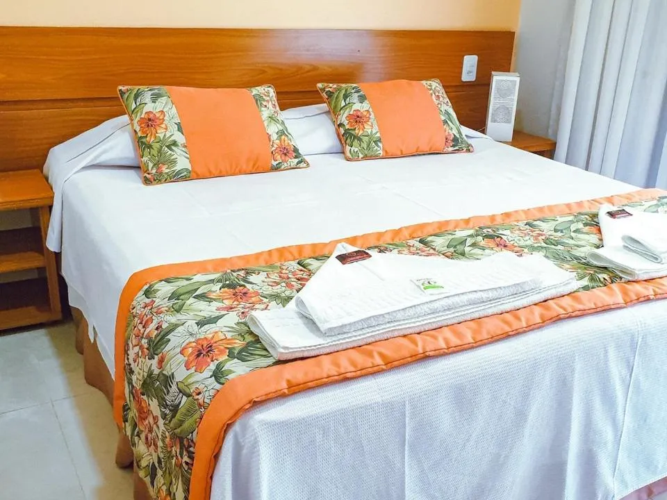 Bed in Pousada Cantinho da Praia