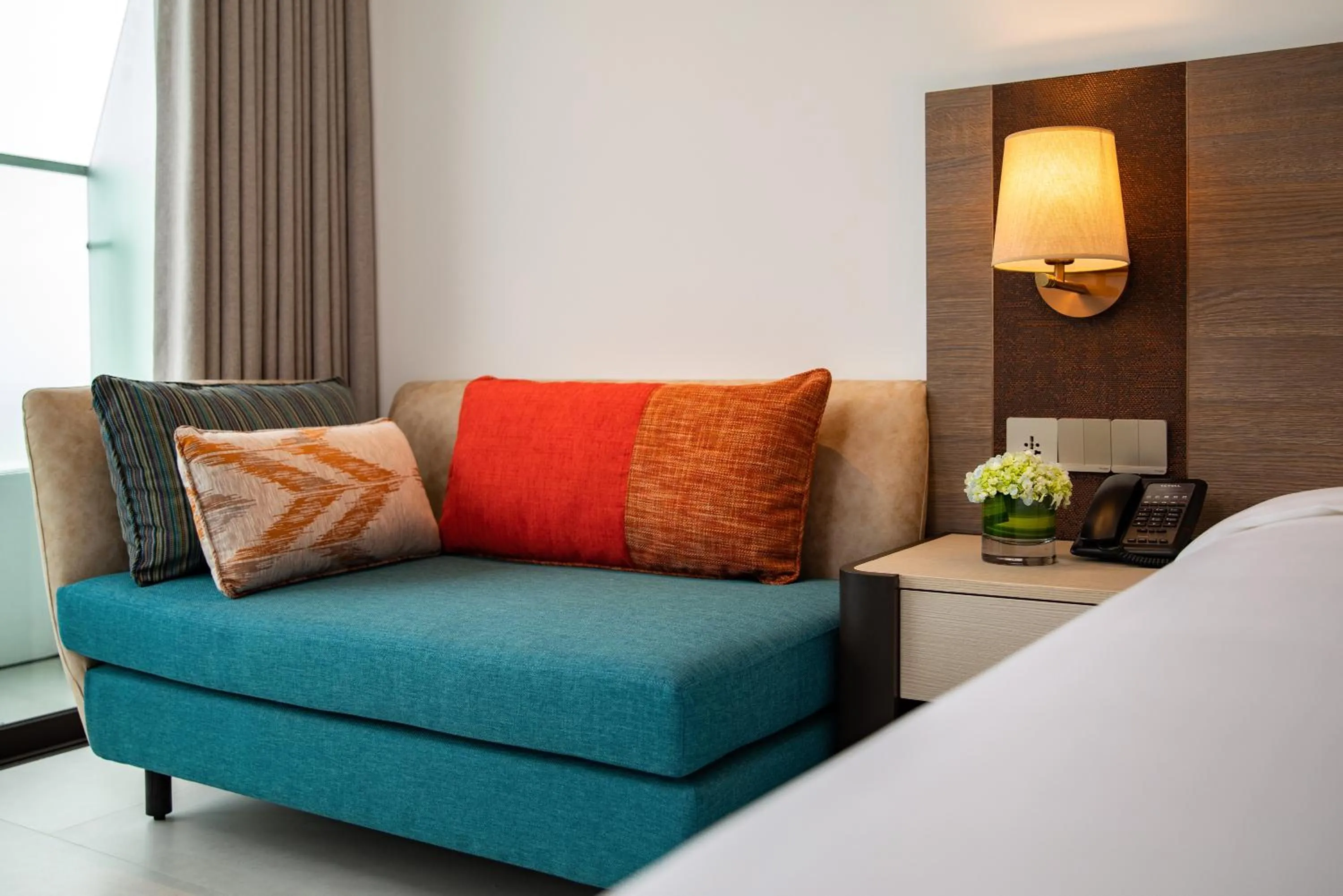 Seating area, Bed in Radisson Hotel Danang