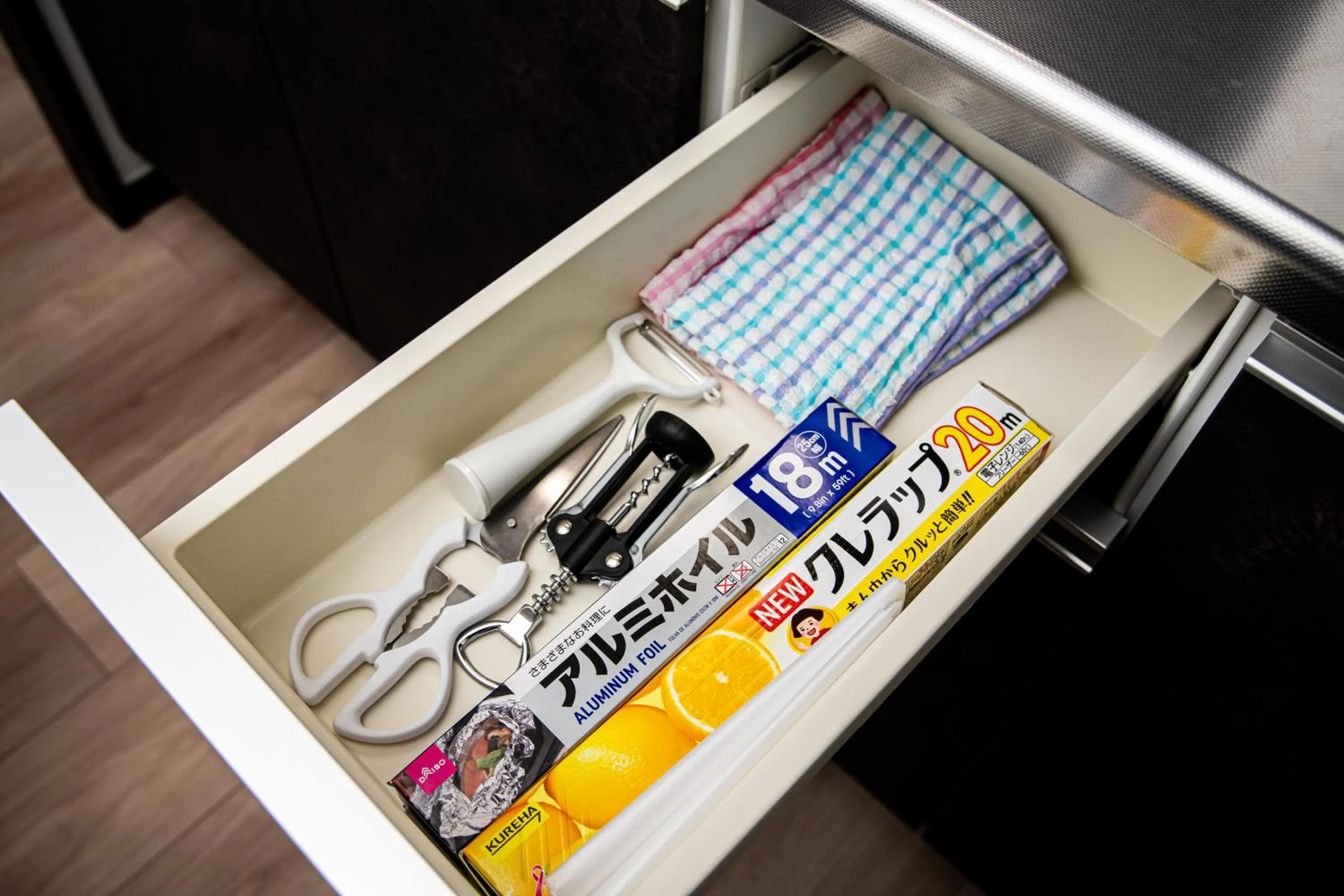 Kitchen or kitchenette in Tomariehotel & condominium