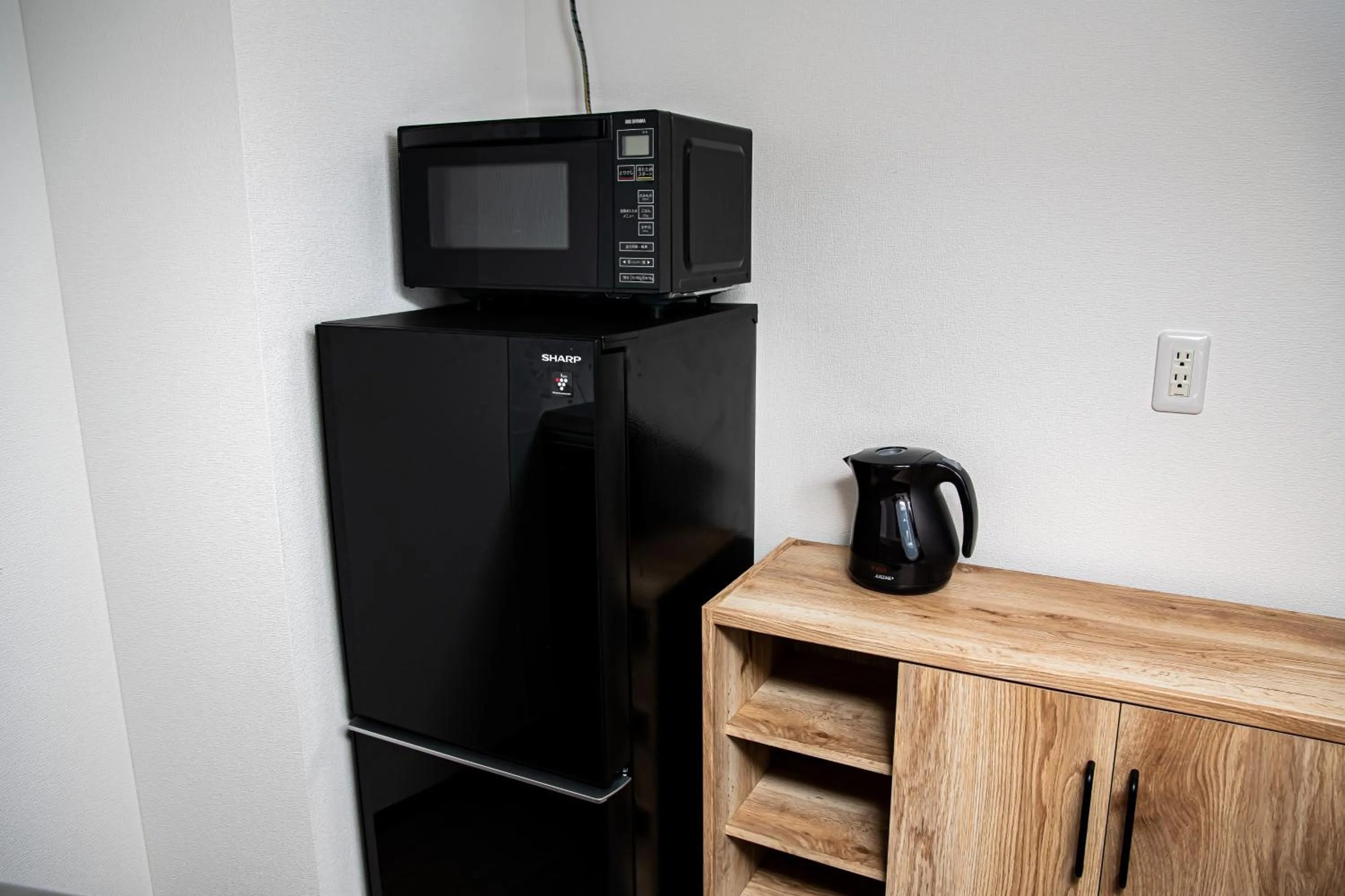 Kitchen or kitchenette in Tomariehotel & condominium