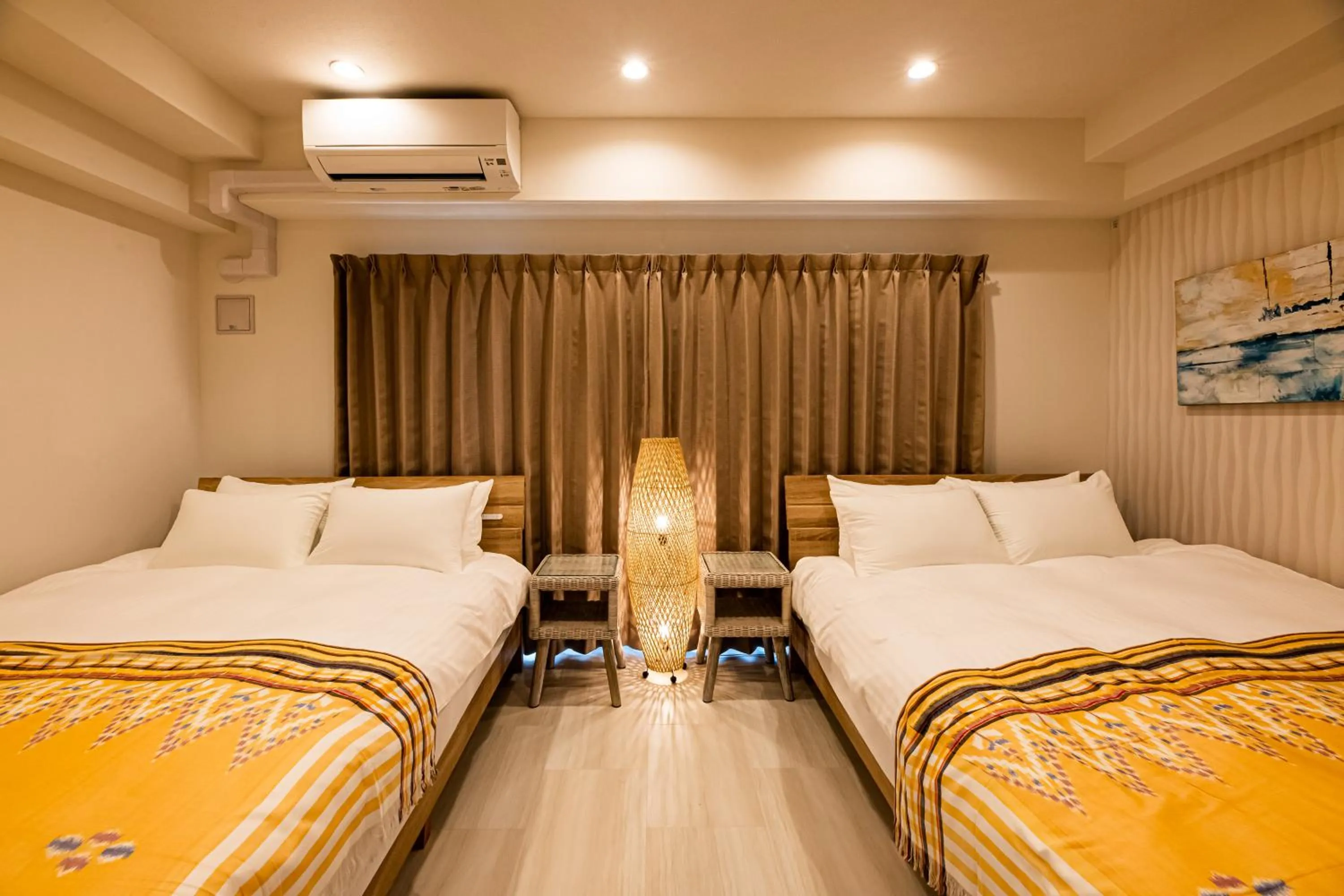 Bed in Tomariehotel & condominium