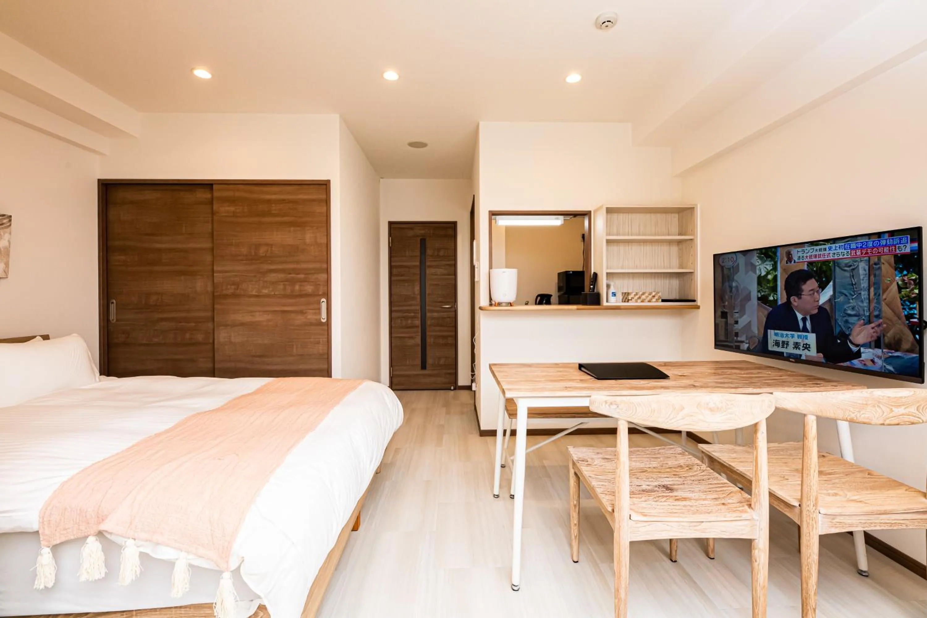 Bed in Tomariehotel & condominium