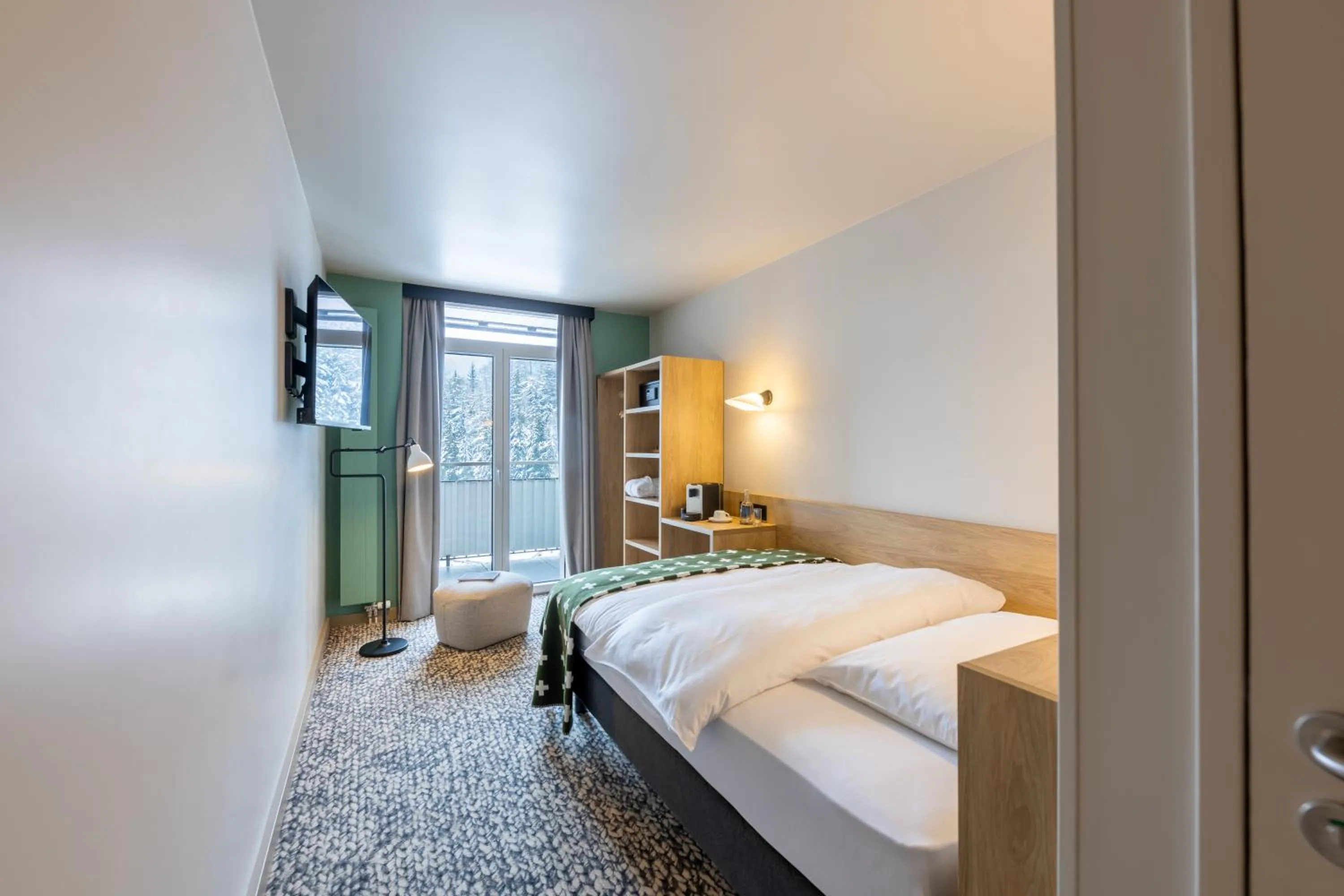 Bedroom, Bed in Hotel Schweizerhof Sils Maria, a Faern Collection Hotel