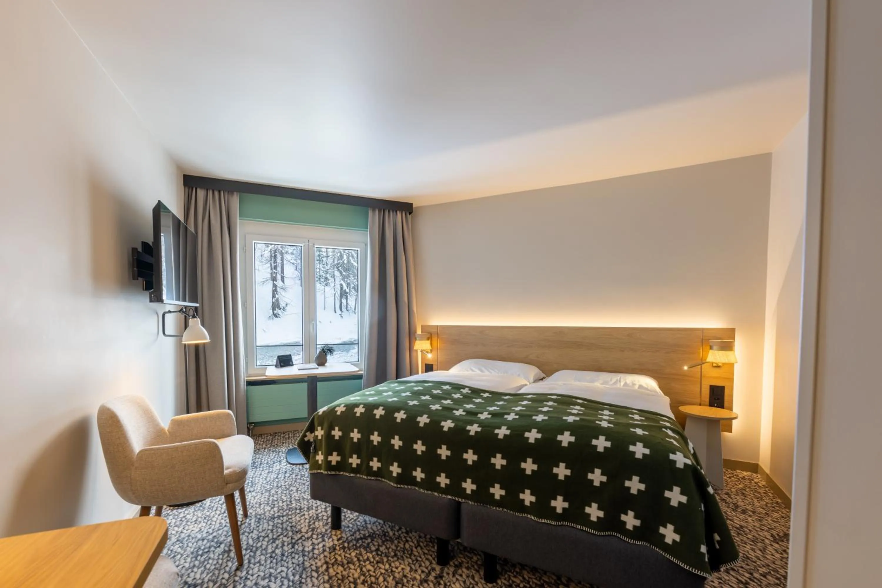 Bedroom, Bed in Hotel Schweizerhof Sils Maria, a Faern Collection Hotel