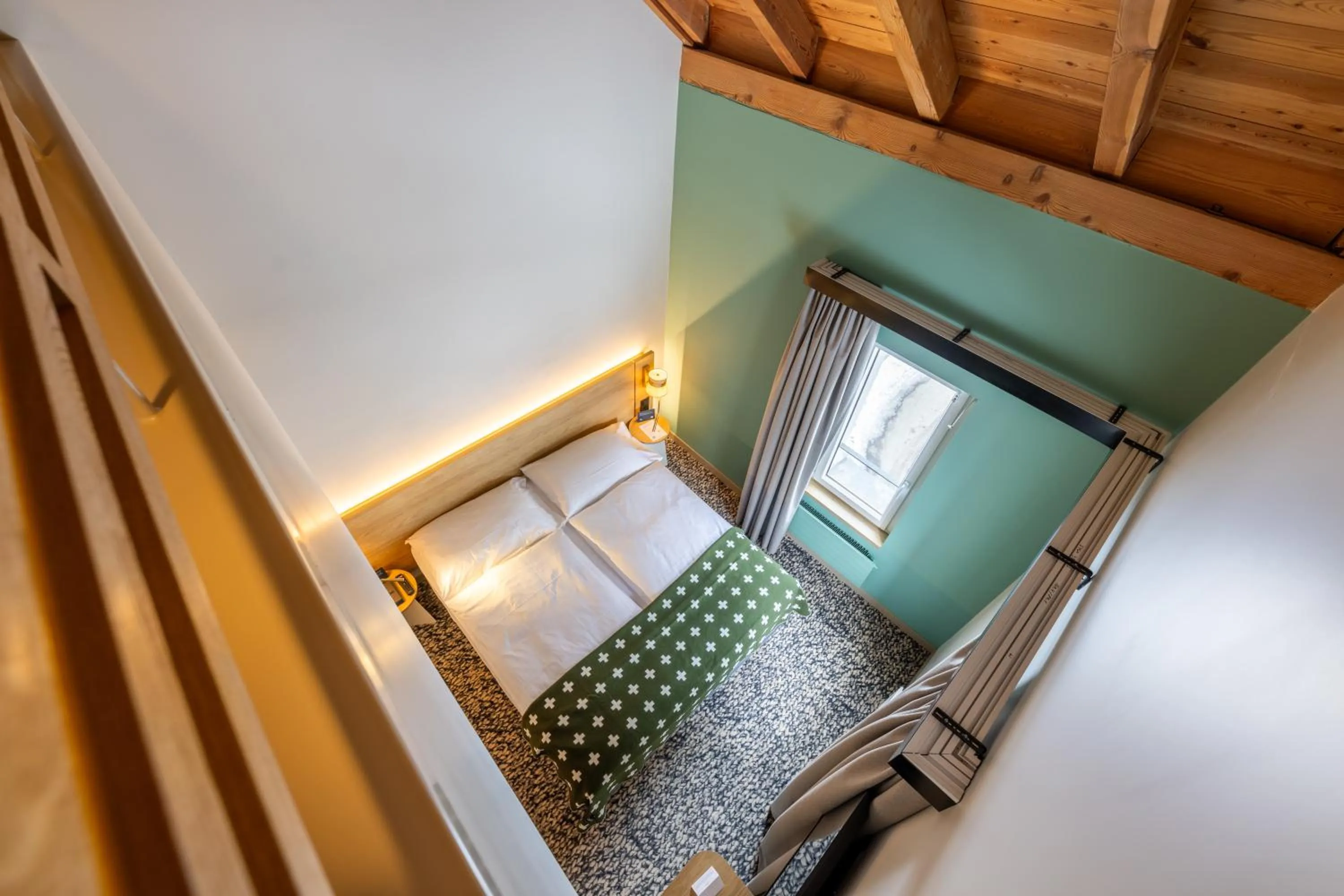 Bedroom, Bed in Hotel Schweizerhof Sils Maria, a Faern Collection Hotel