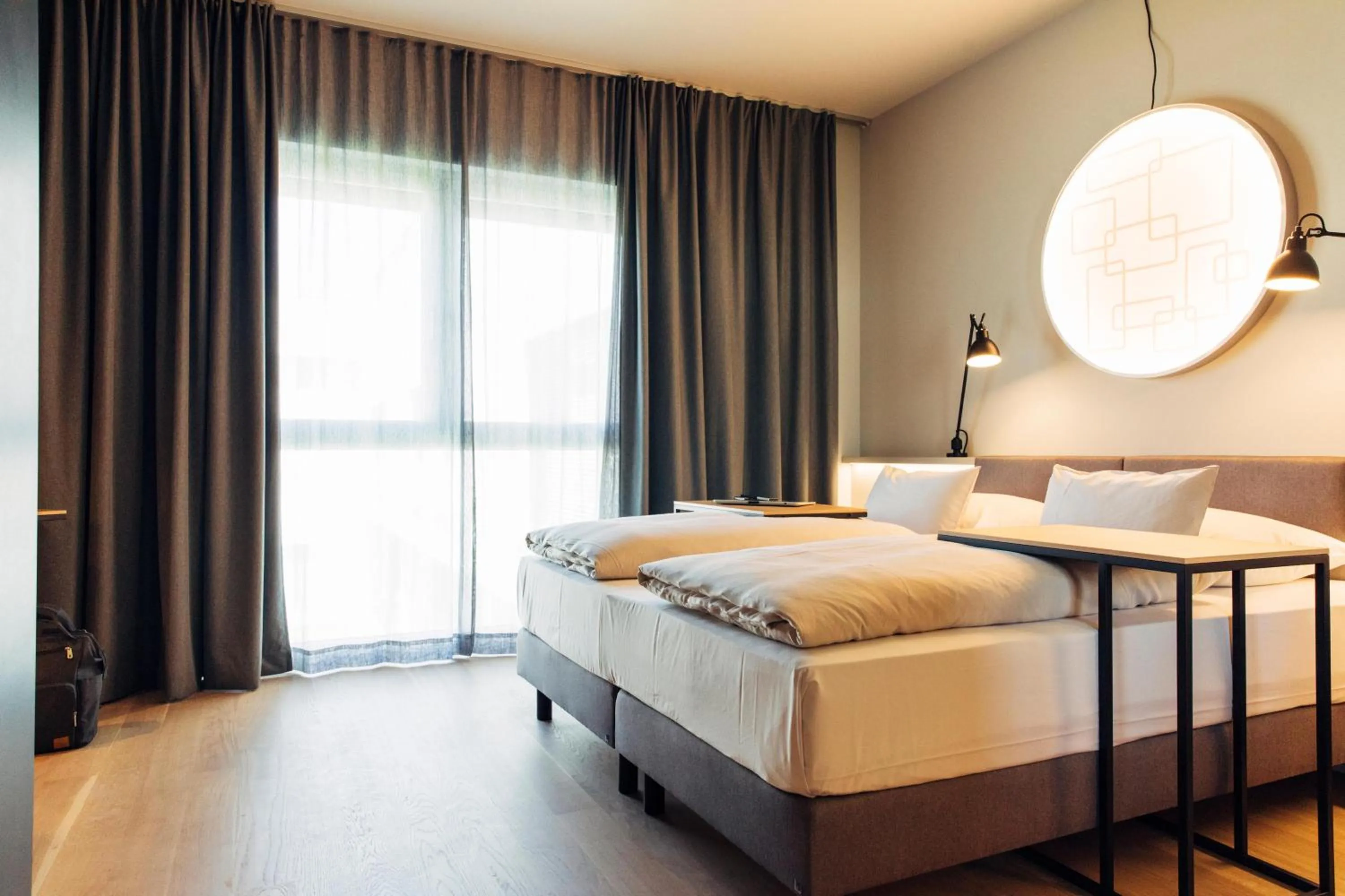 Photo of the whole room, Bed in harry's home Steyr hotel & apartments