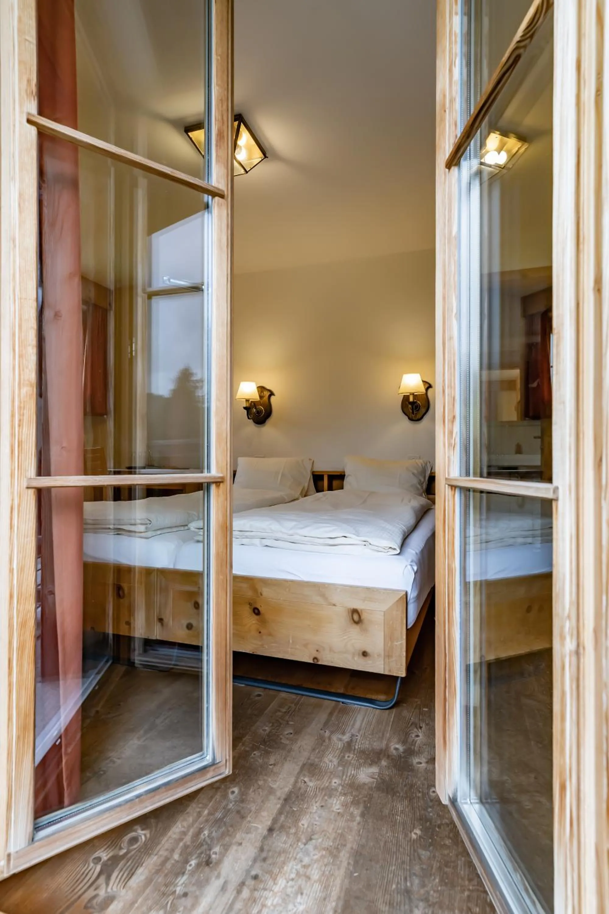 Bed in Hotel Chesa Pool