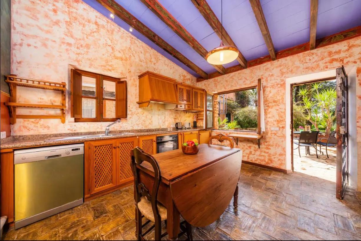 Kitchen or kitchenette in Es Revellar Art Resort - Adults Only