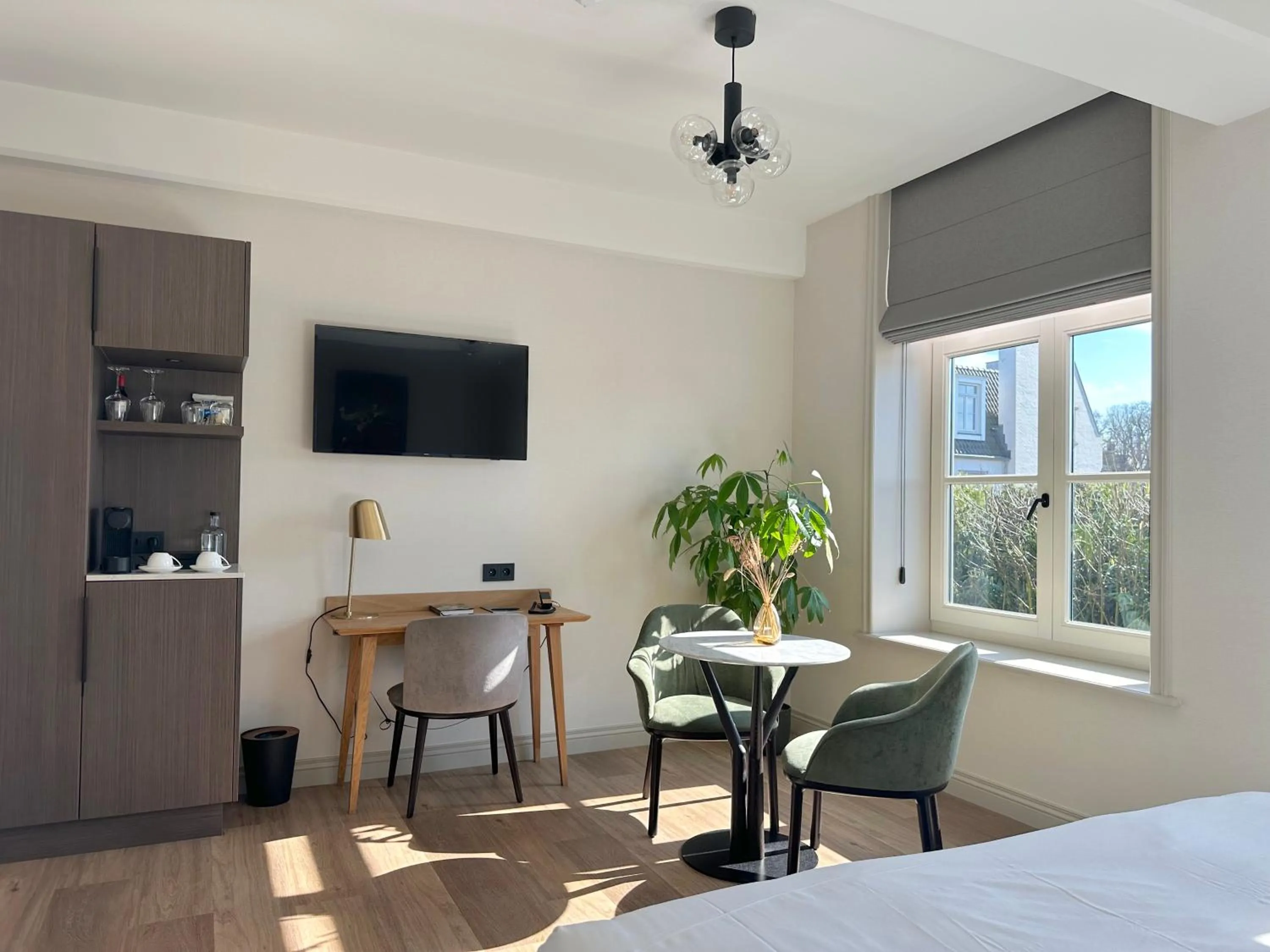 Seating area, Bed in Hotel Flora Batava