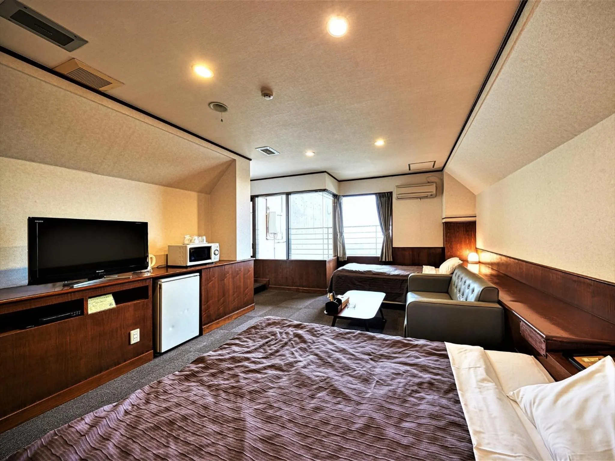 Photo of the whole room, Bed in Purari OKINAWA