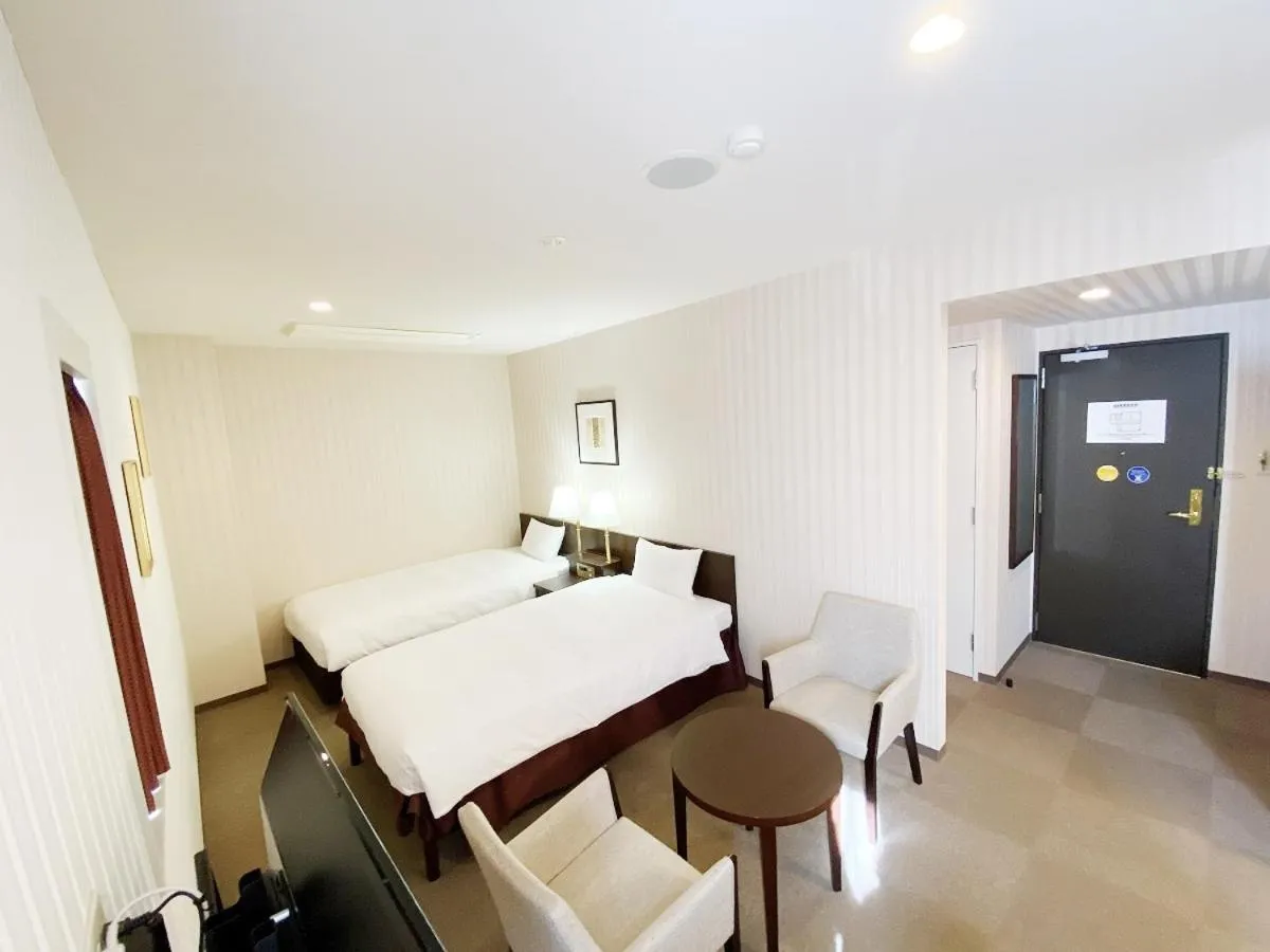 Bed in Smile Hotel Kitaasaka