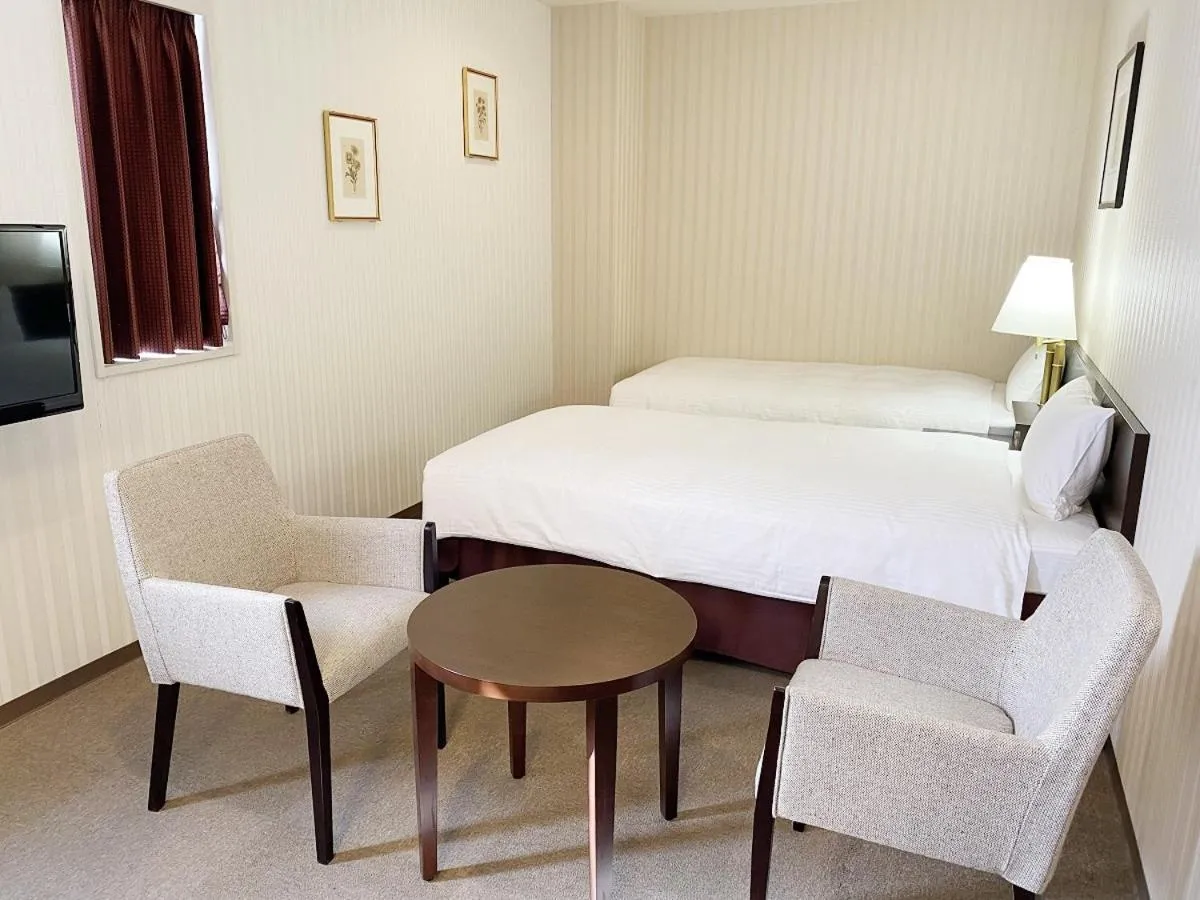 Bed in Smile Hotel Kitaasaka