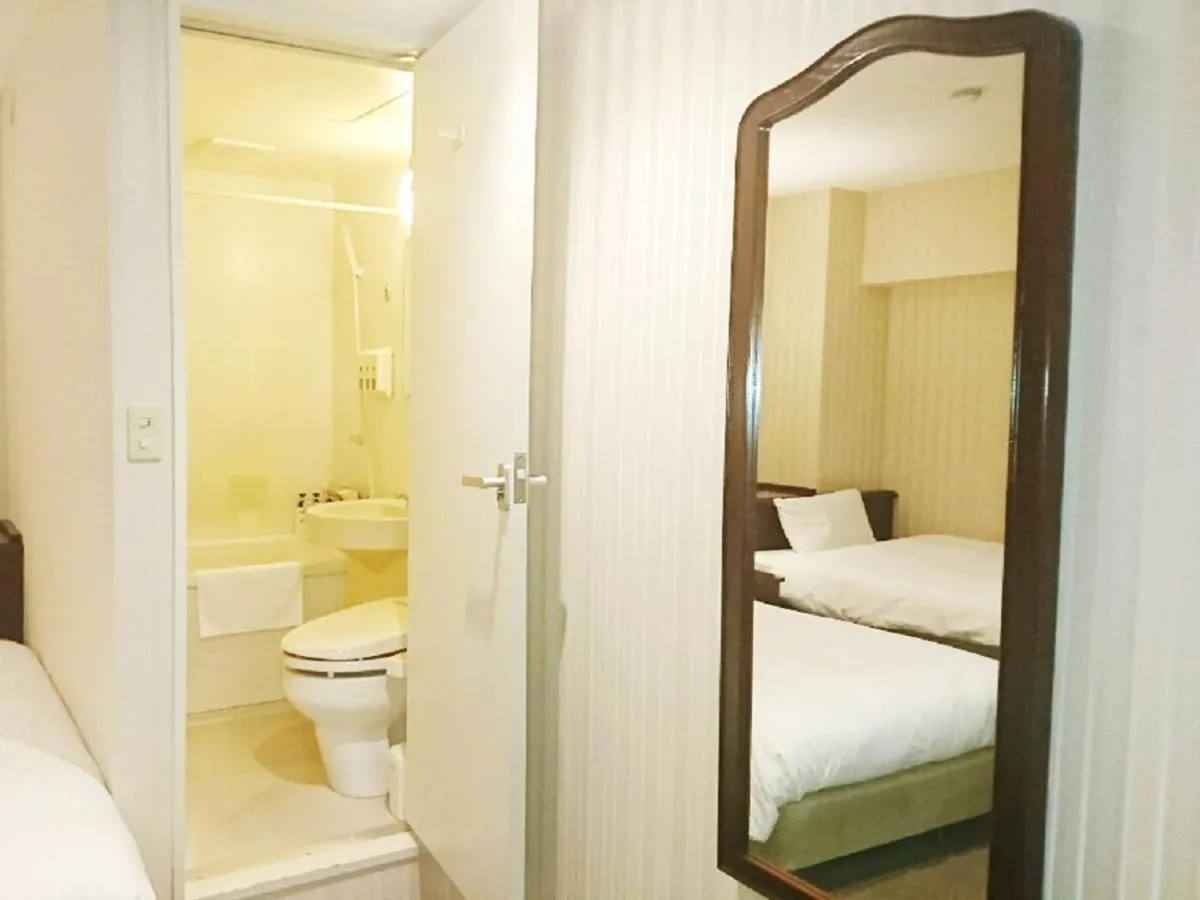 Bed in Smile Hotel Kitaasaka