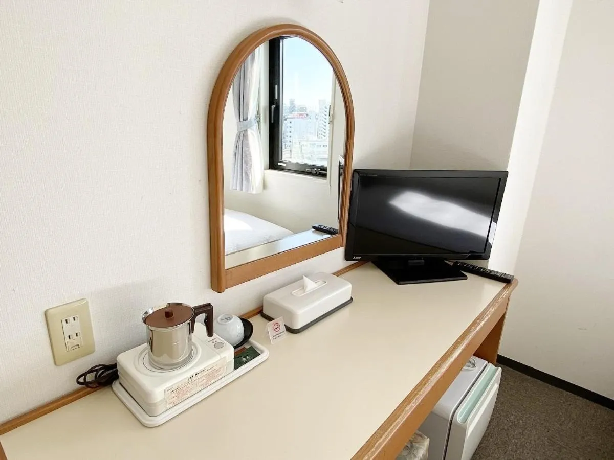 Bed in Smile Hotel Kitaasaka