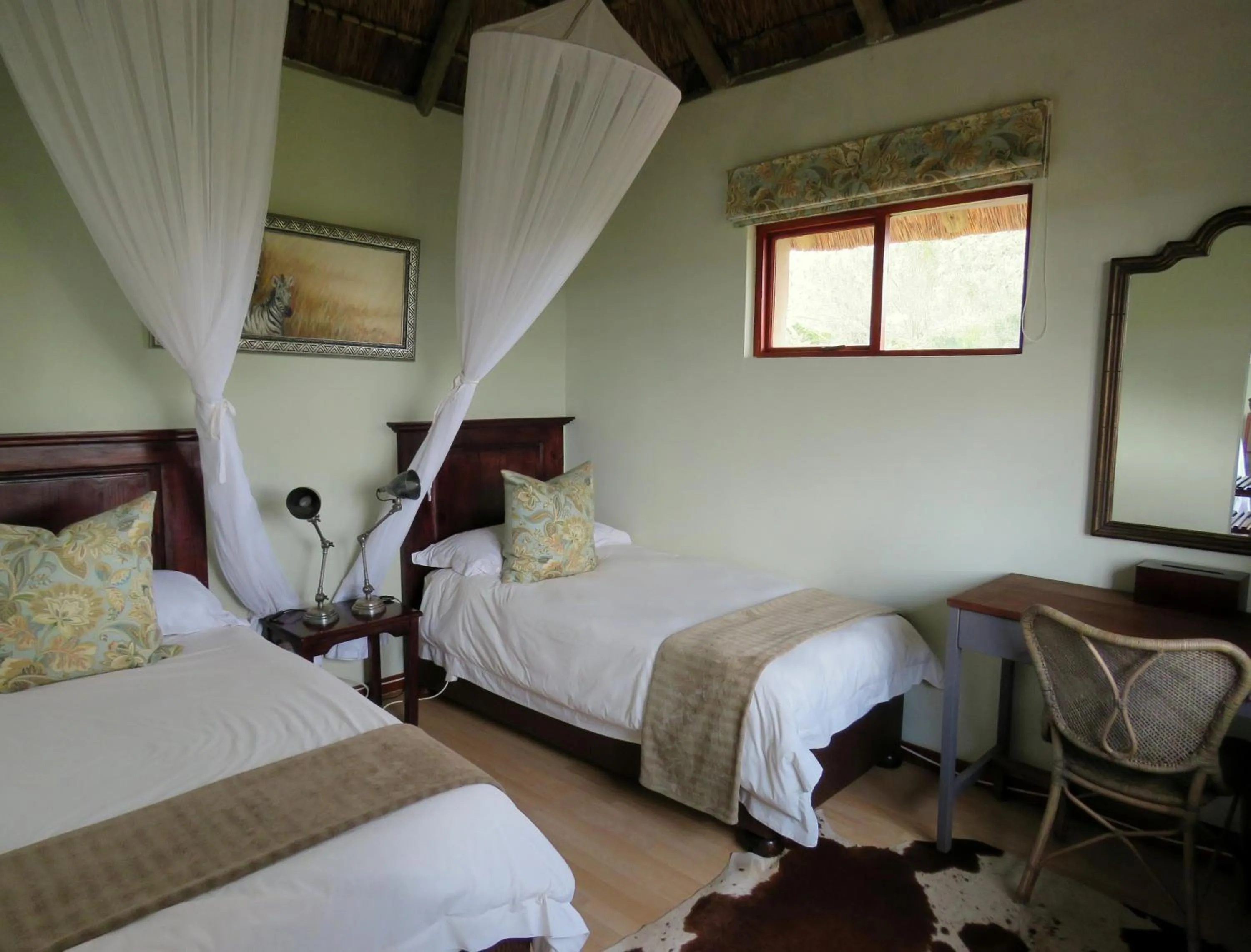 Bed in Woodbury Lodge – Amakhala Game Reserve