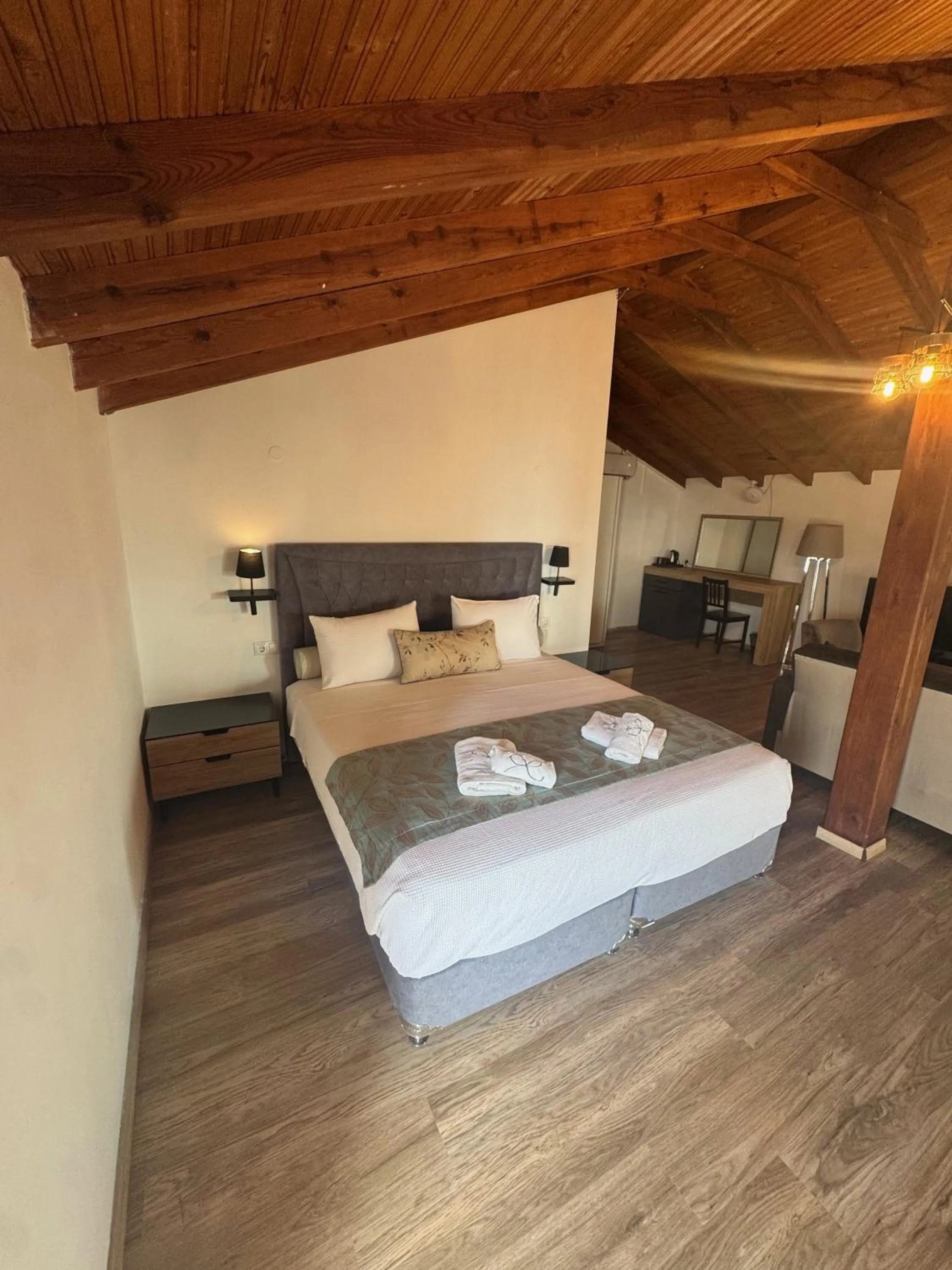 Bed in Regos Resort Hotel