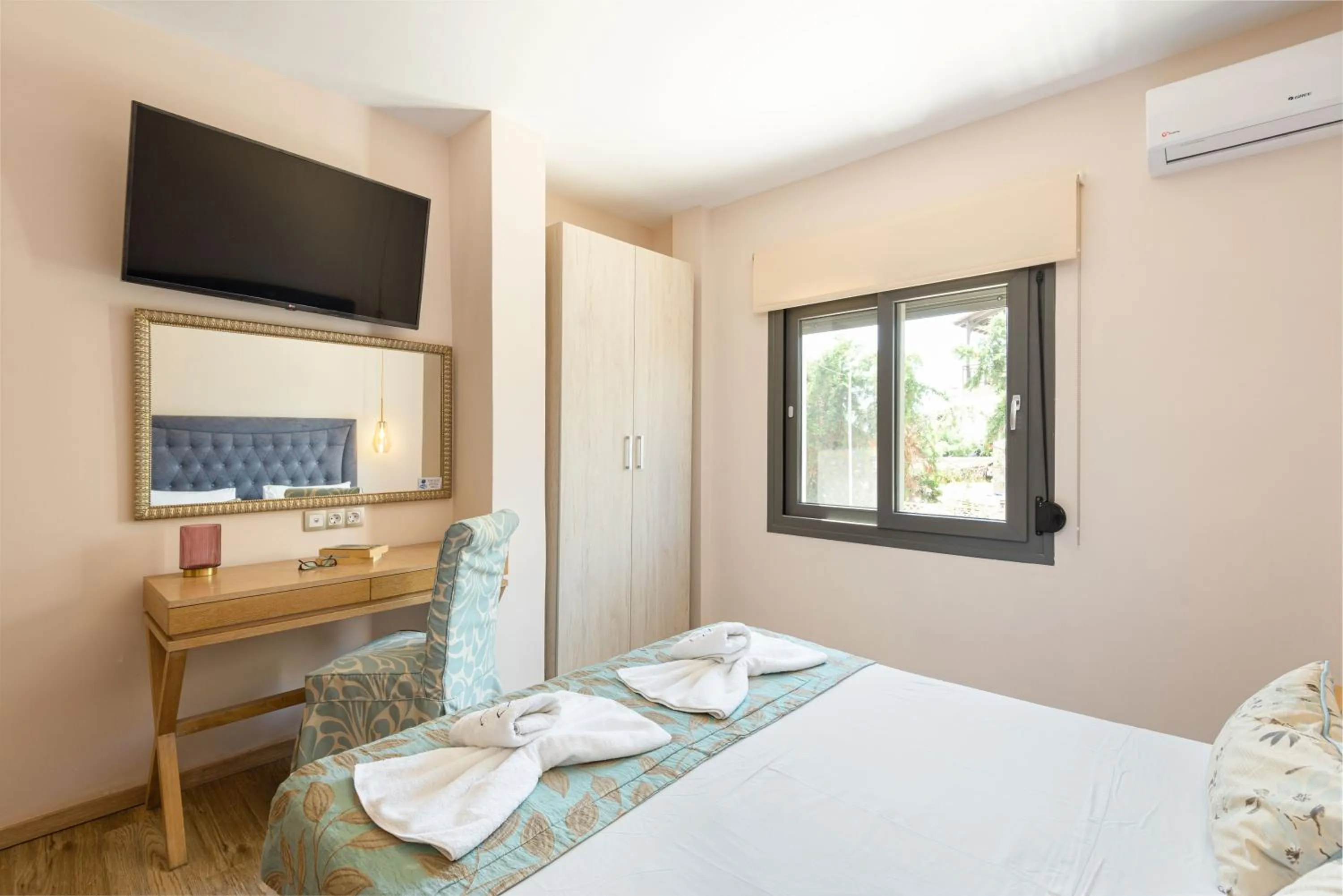 Bed in Regos Resort Hotel