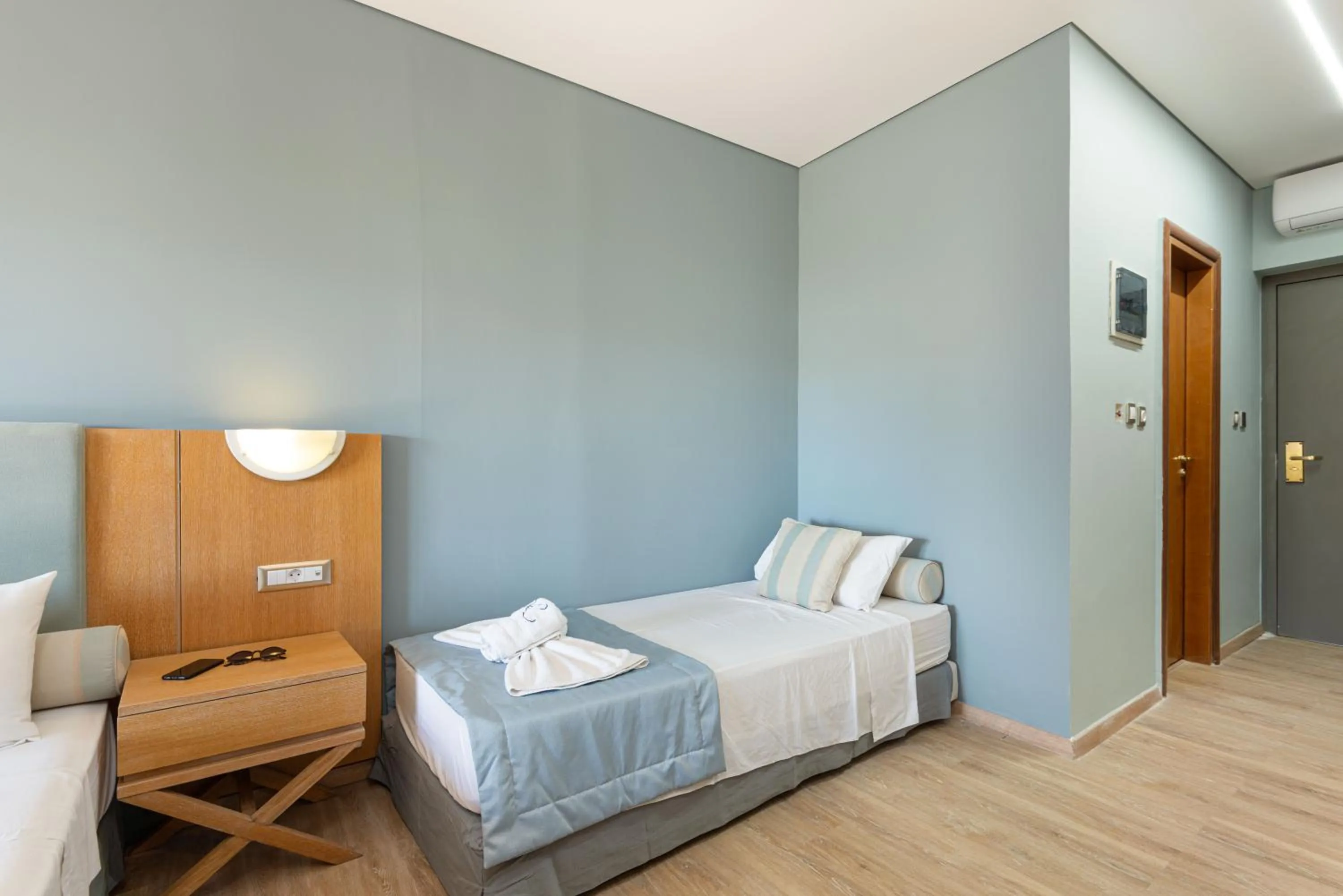 Bed in Regos Resort Hotel